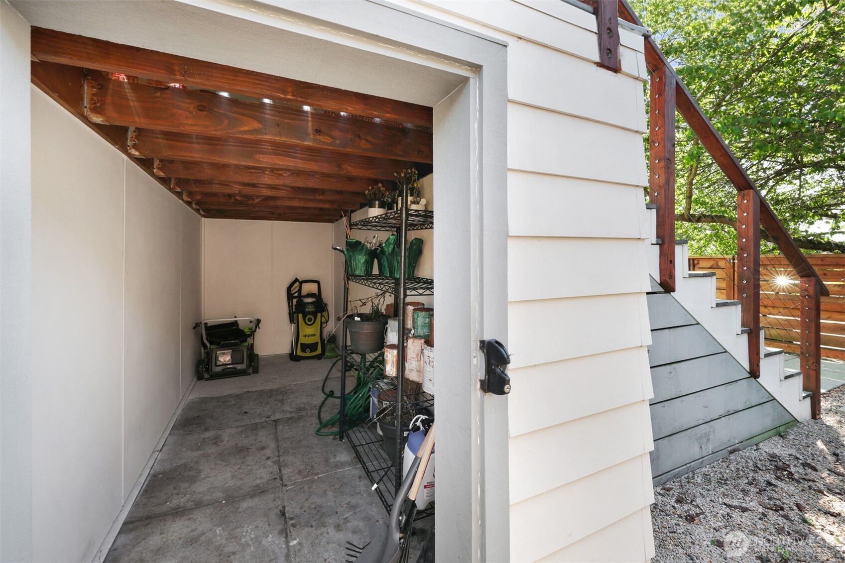 One of three under patio storage spaces