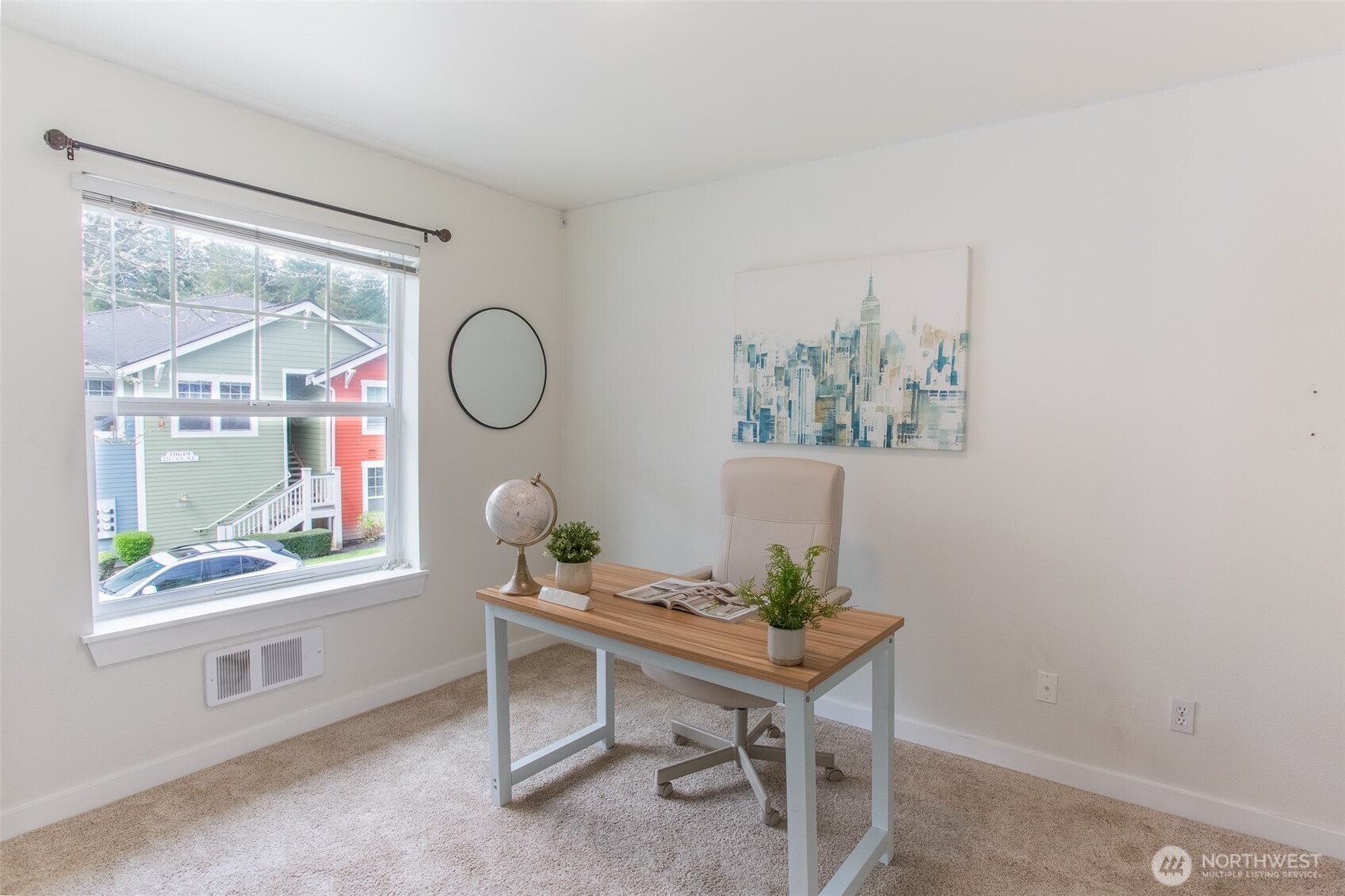 One of three Bedrooms.  This bedroom is currently Staged as a Home Office.