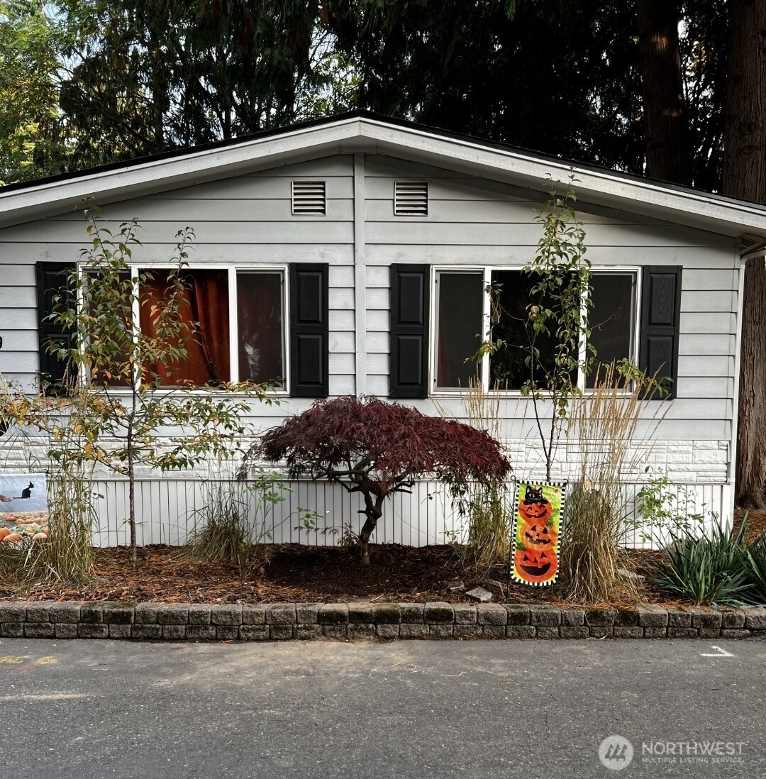 Welcome home with your beautiful red maple in front