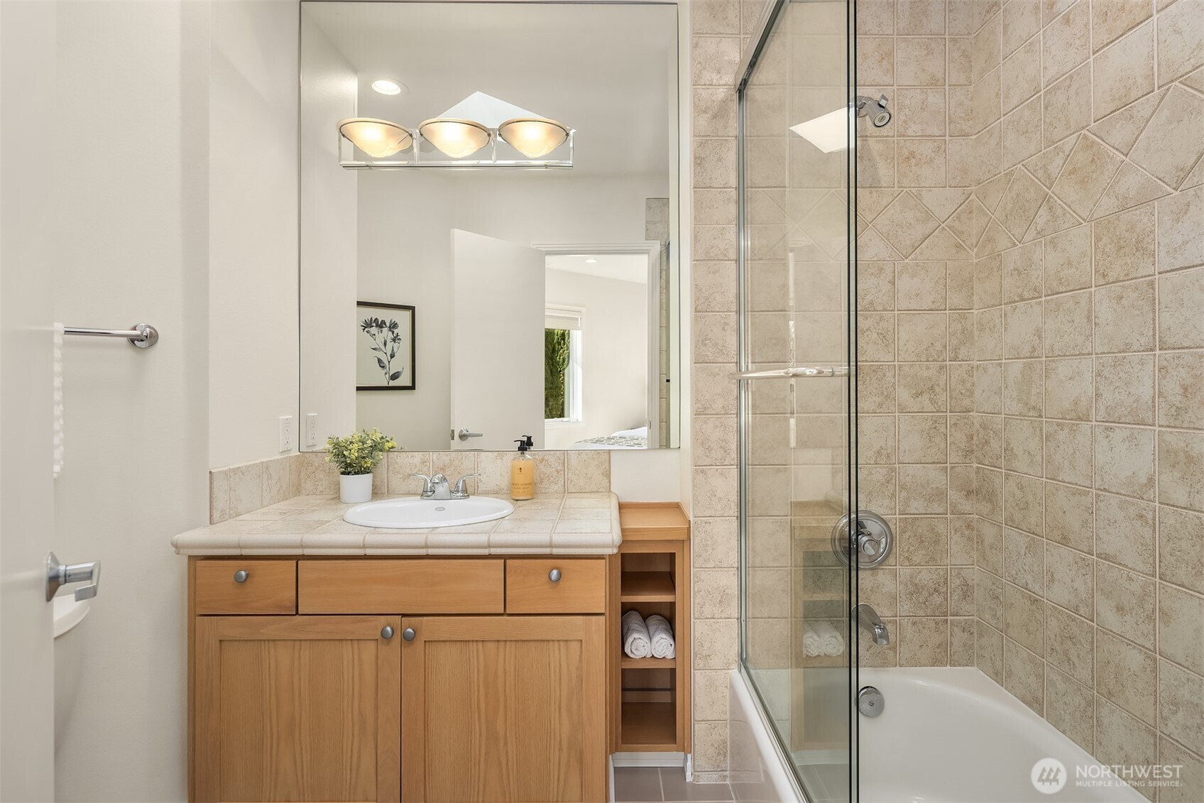 Thoughtfully designed en-suite guest baths offer a resort-like experience, providing comfort and seclusion for long-term visitors or family members.