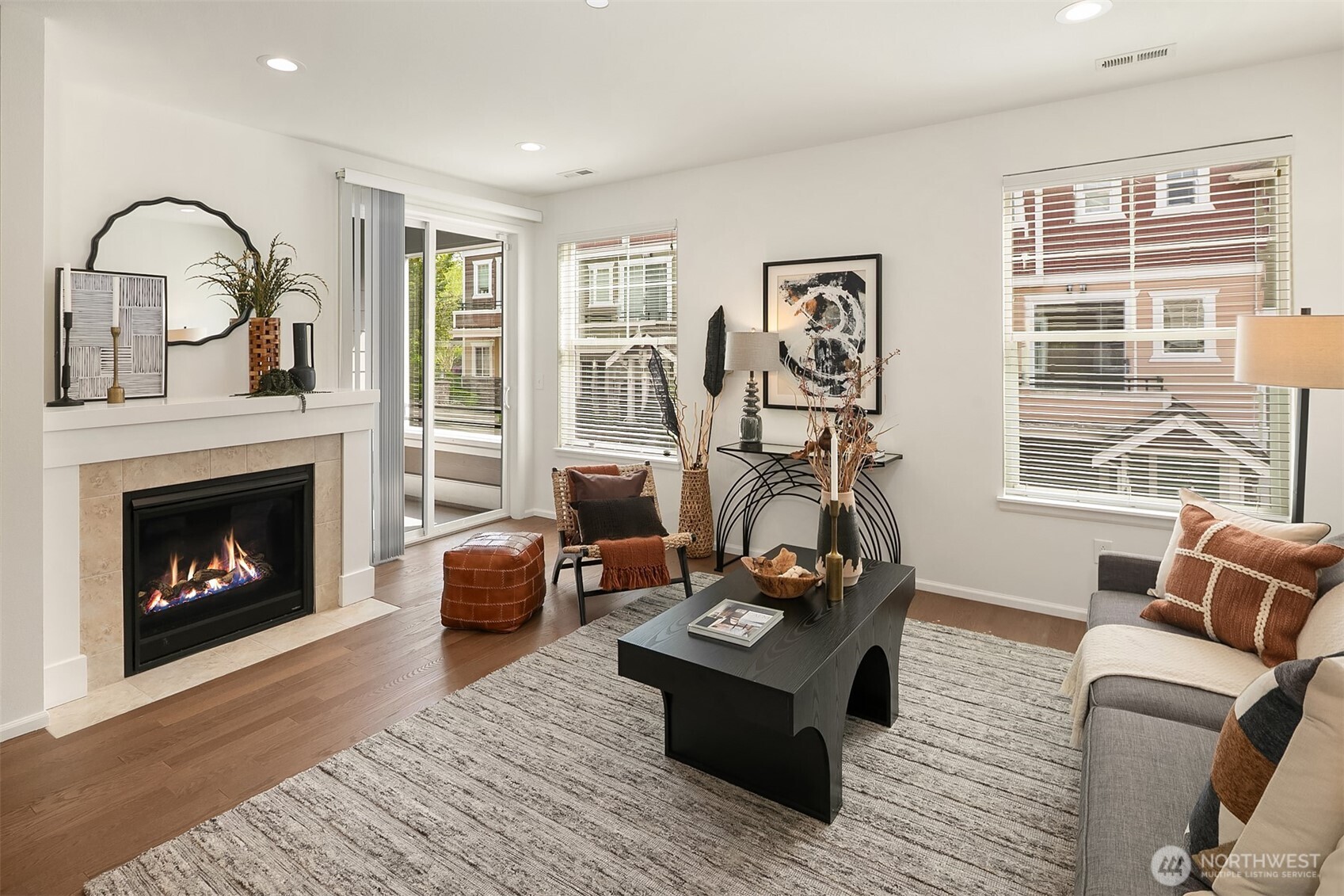 Spacious living room with cozy firefpace and flexible layout options