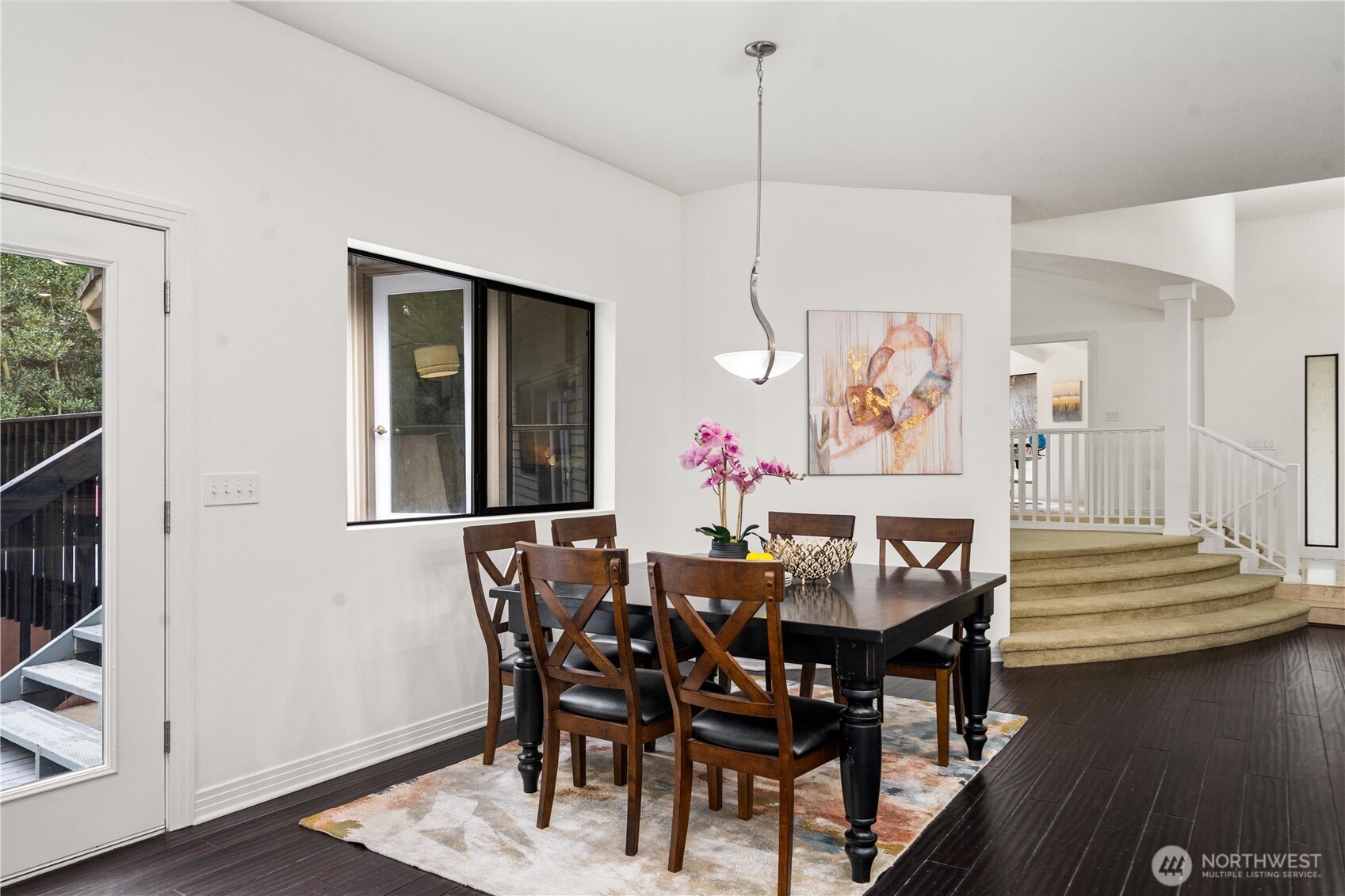 A comfortable breakfast nook conveniently located next to the kitchen