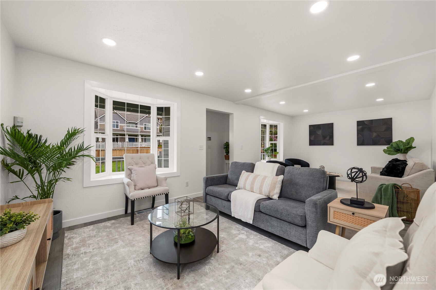 The lighting really brightens up the room, notice the cute entry space, you could put a small bench or coat hooks in that area!
