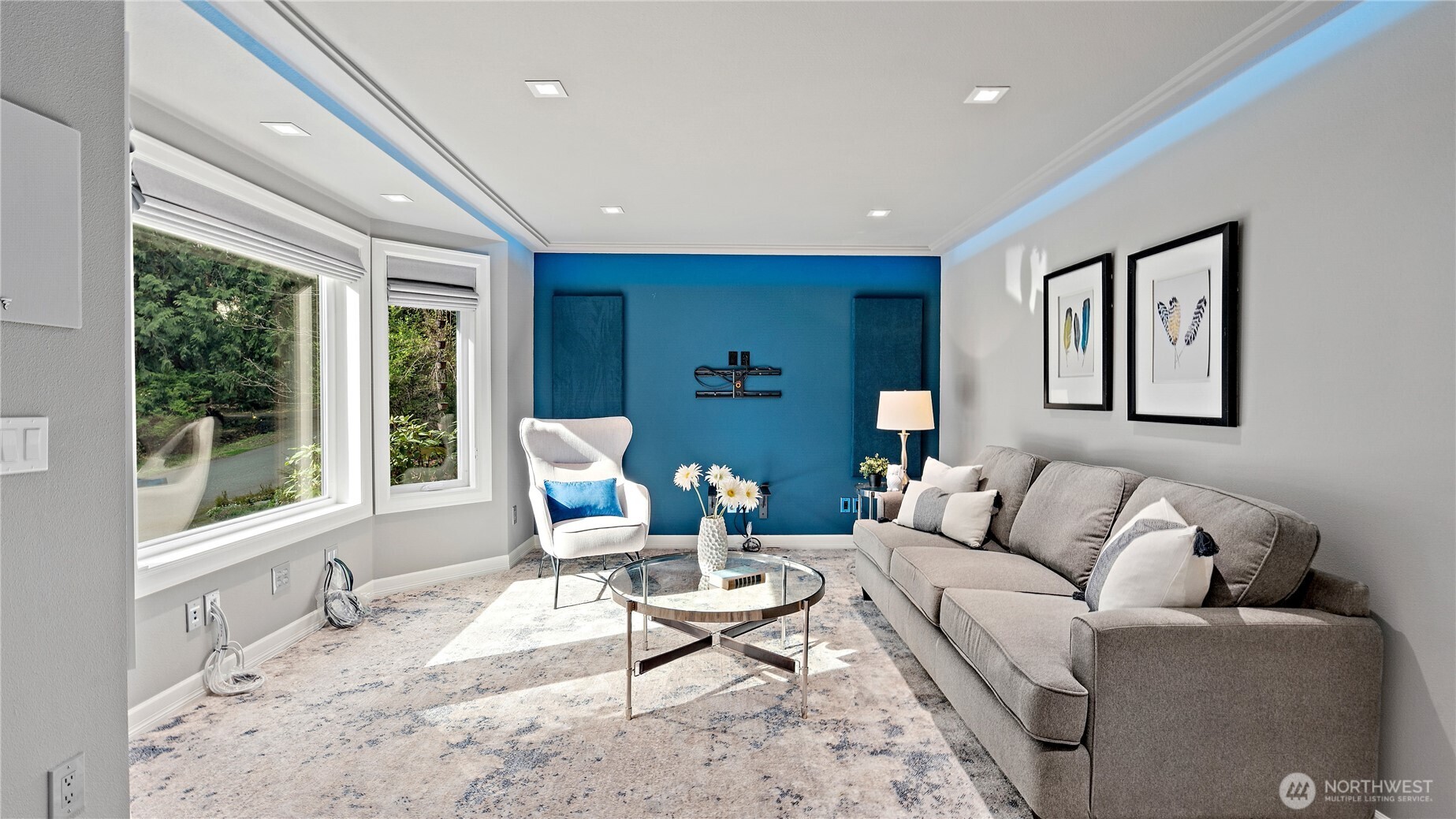 Upstairs, the owner’s suite is generous in scale and rich in comfort, with a private balcony, freestanding gas fireplace, and a high-end ceiling fan that gives the room an added sense of polish.