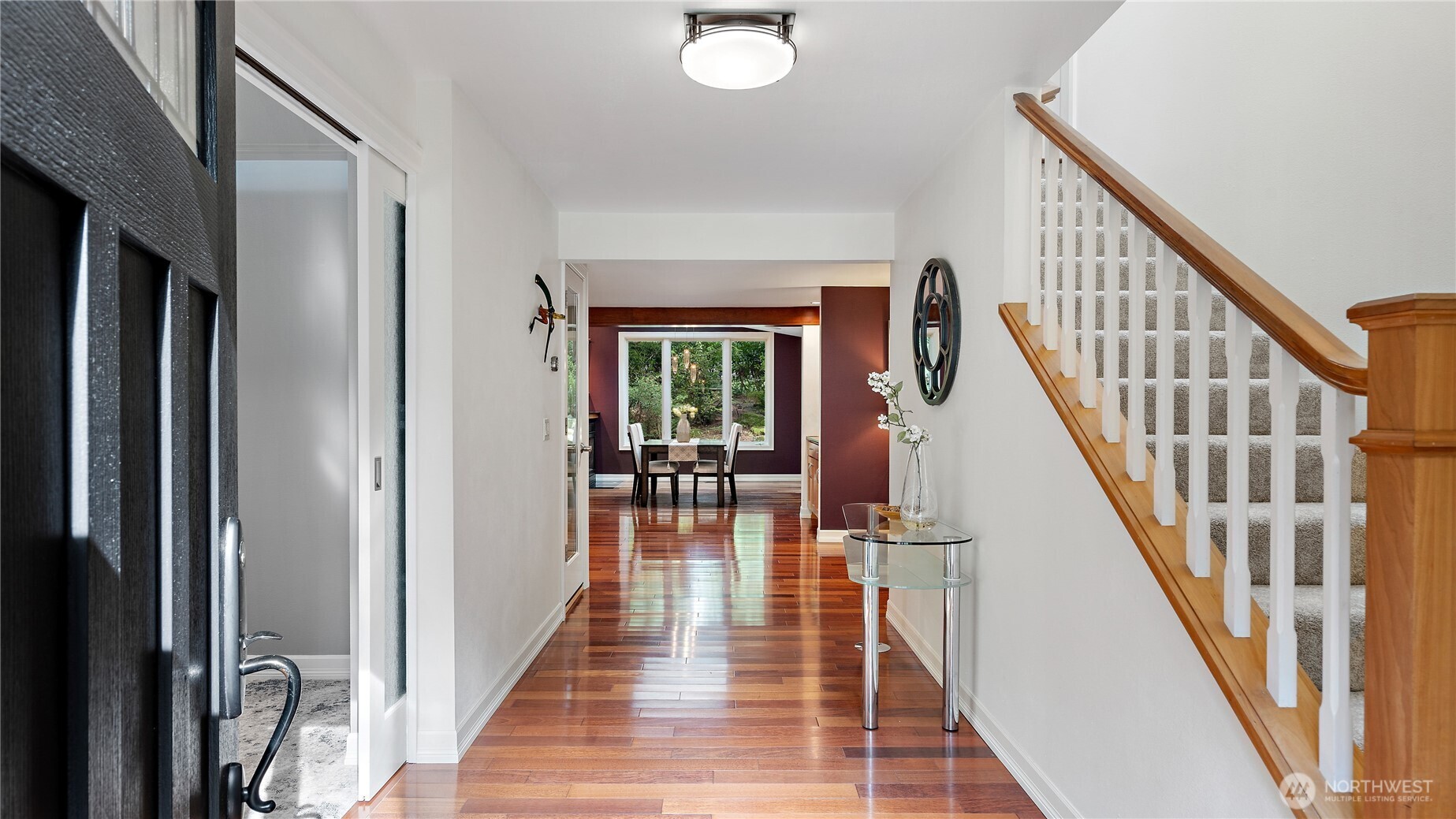 The covered entry draws you in, and the newer front door and exterior lighting offer just a hint of the many thoughtful upgrades waiting inside. It’s a lovely first impression, with even more to appreciate beyond the threshold.