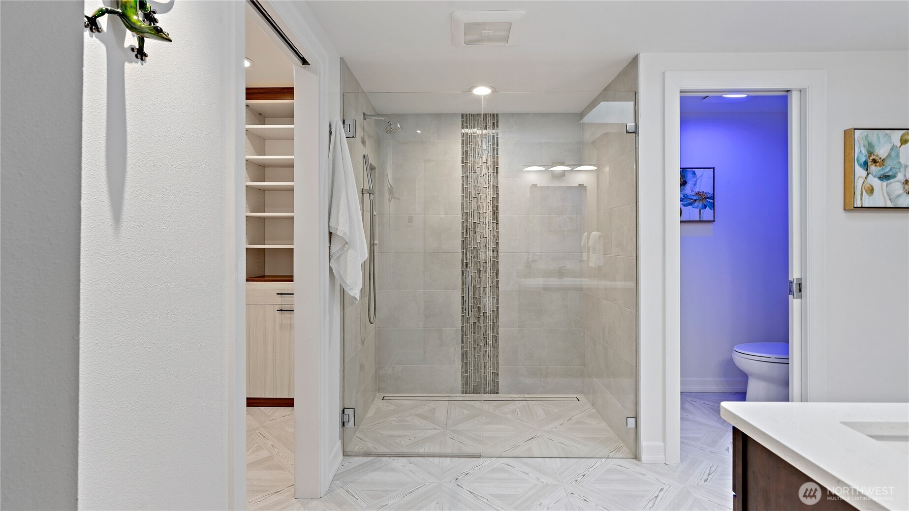 The walk-in closet is such a delight, thoughtfully outfitted with a California Closet system and special built-in features that make staying organized so much easier. It’s one of those details you’ll appreciate every single day.