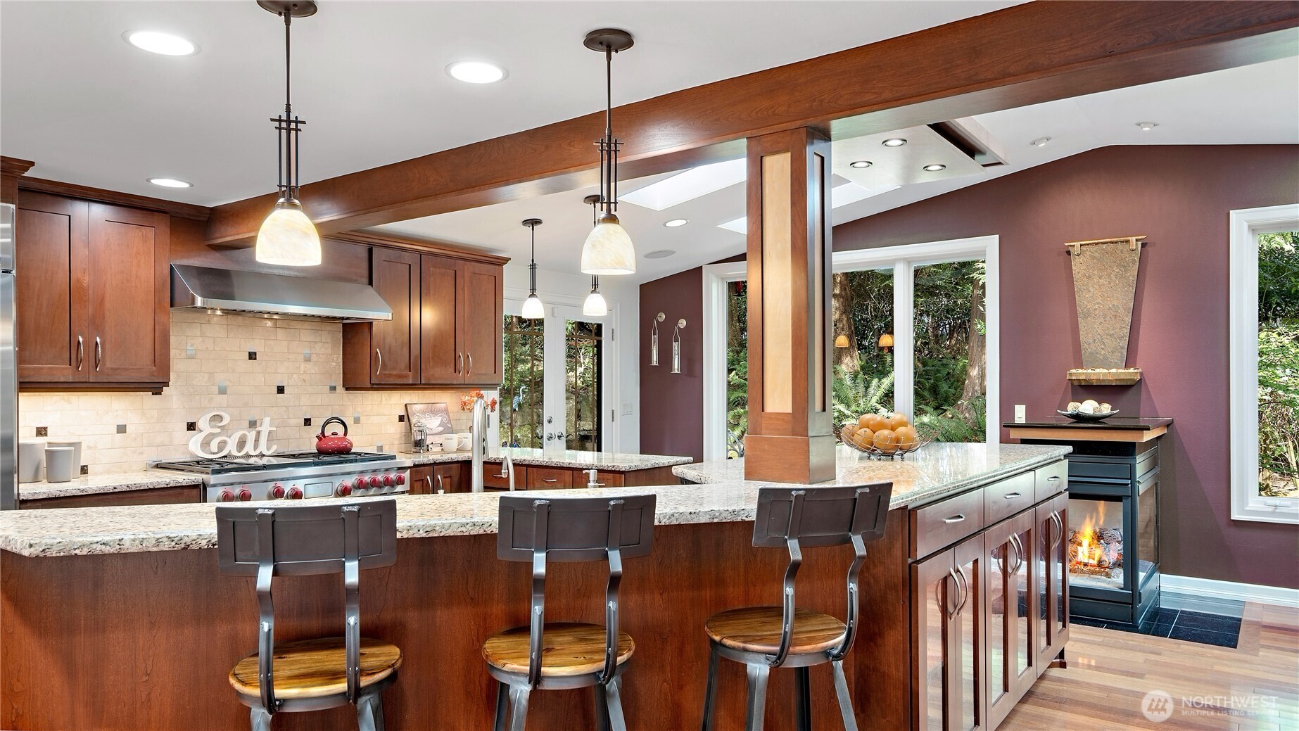 The light bridge over the island is another beautiful nod to the home’s Norsk design, bringing both form and function to the space. And with six skylights overhead, this kitchen is absolutely filled with natural light.
