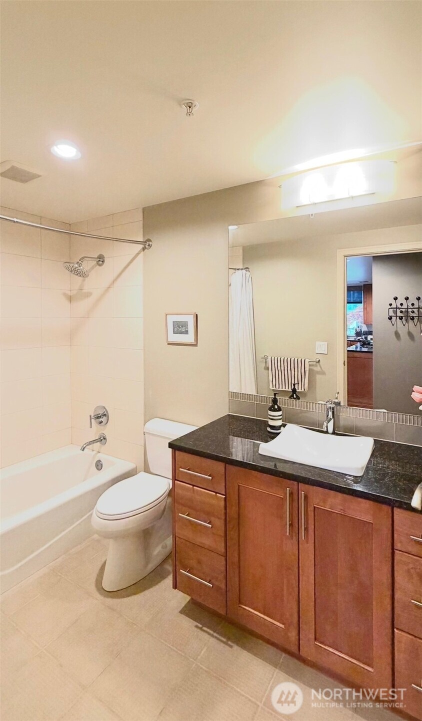 Bathroom with generous vanity space and functional layout.