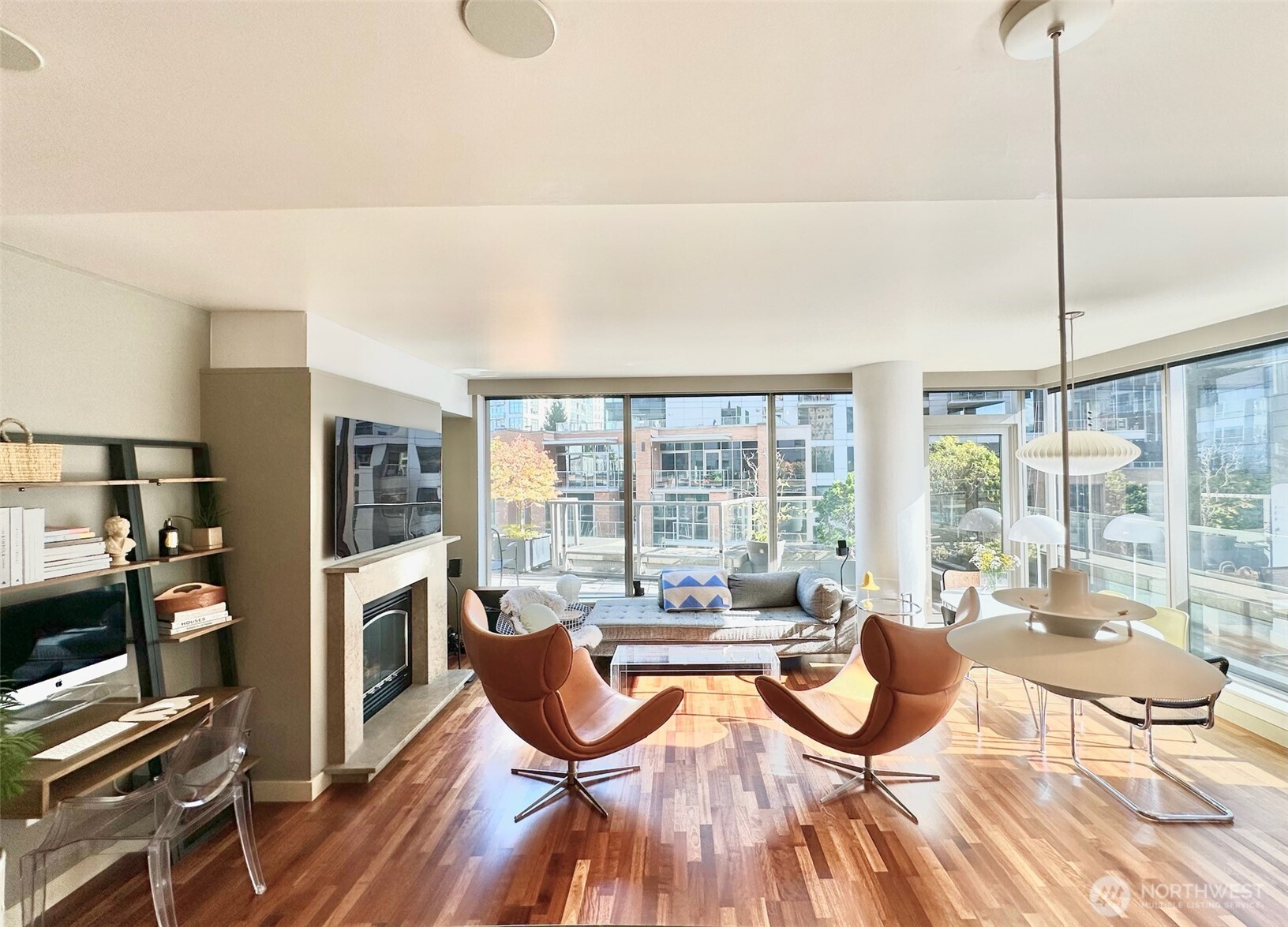 Open-concept living room featuring hardwood floors and seamless indoor-outdoor connection.
