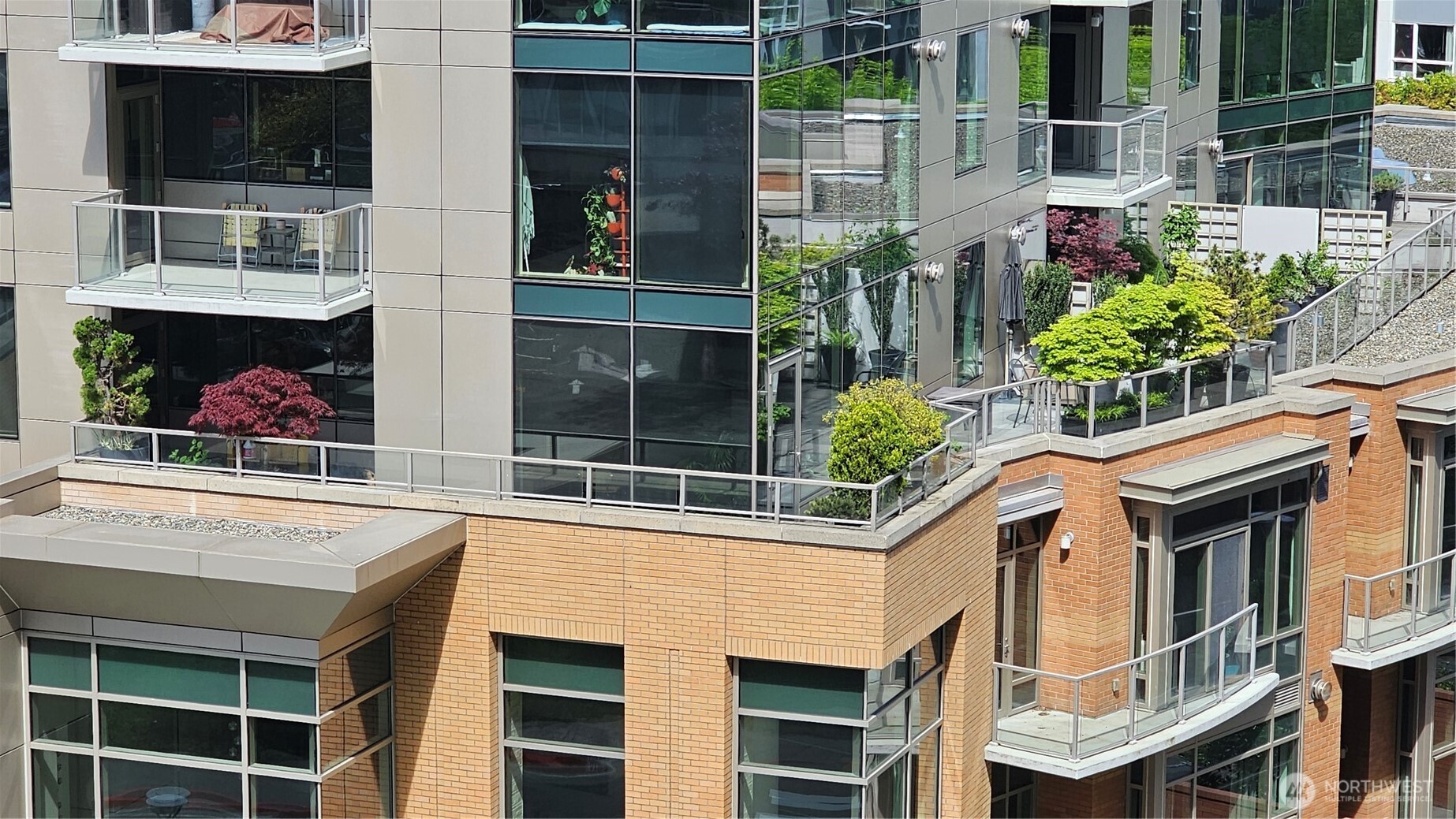 Elevated podium level showcasing expansive private terraces and thoughtfully designed outdoor living spaces