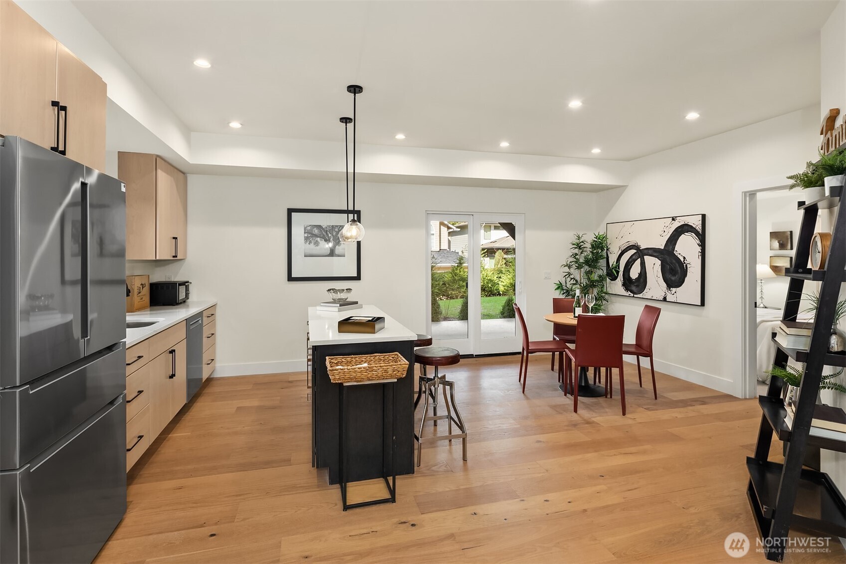 Lower-level Mother-in-law unit offers a completely separate living space with private entry and patio access