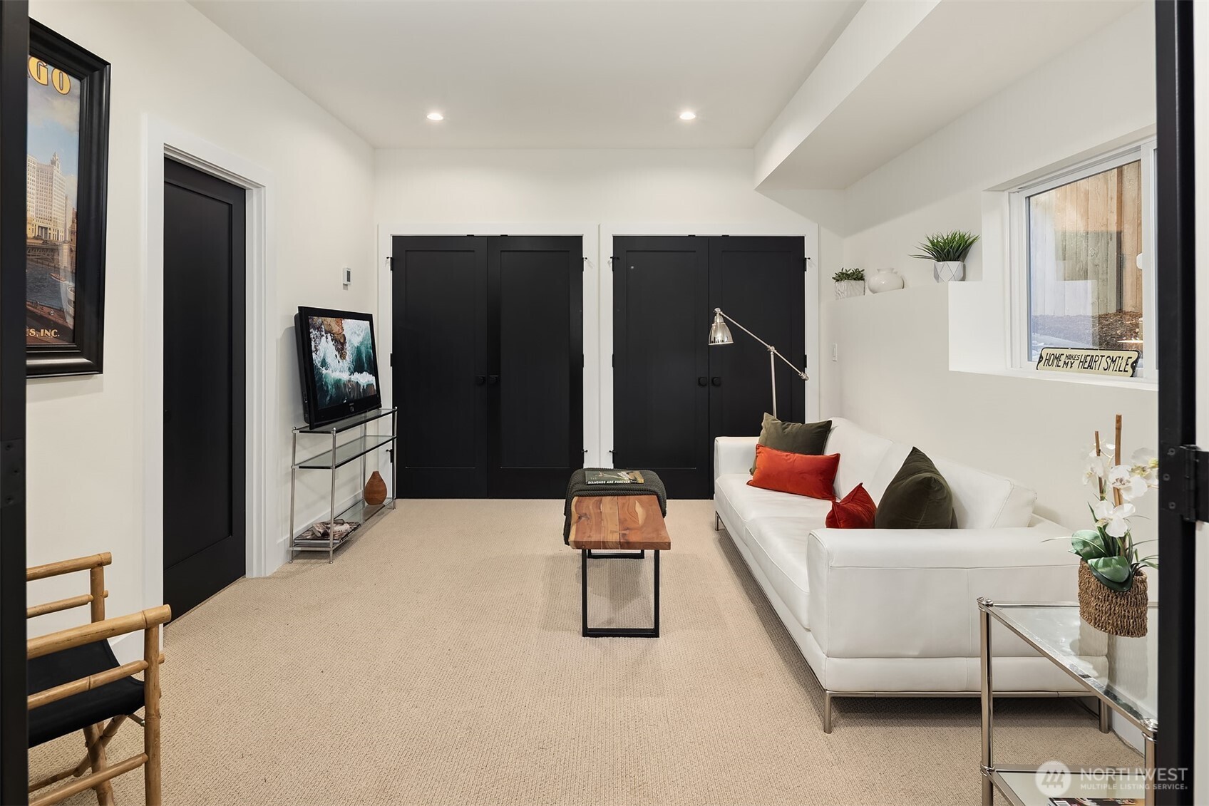 Bedroom 2 with a full ensuite bath or bonus/media space