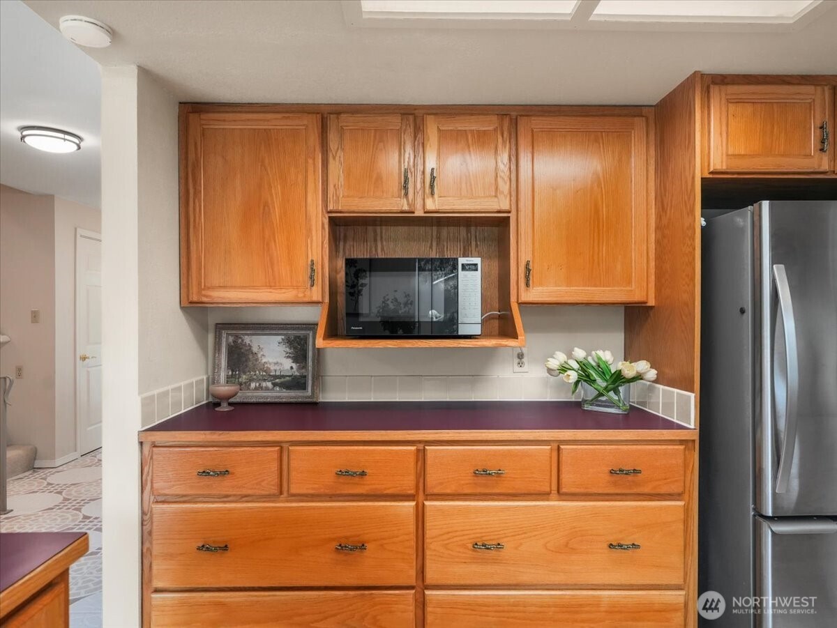 Extra counter space and drawers in the kitchen.