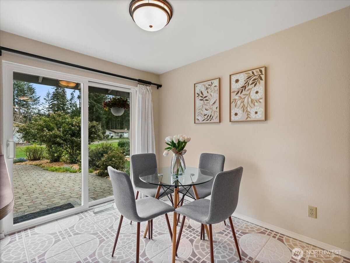 Eating space off the kitchen and access to the beautiful patio.