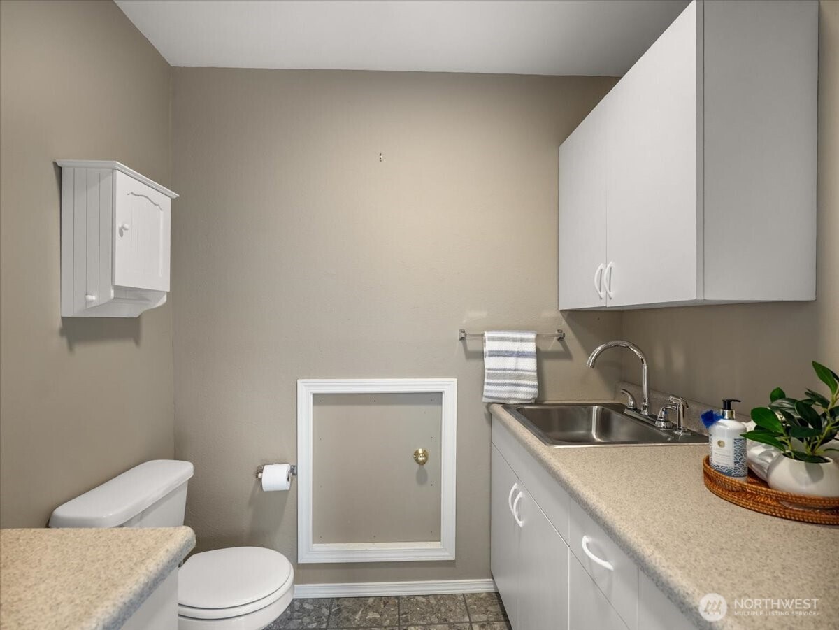 Powder room and extra sink space.