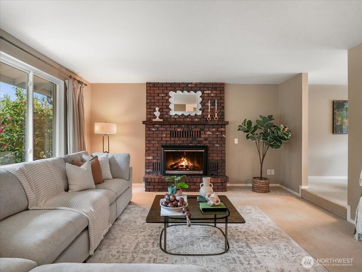 A gas fireplace nicely warms up the living room.