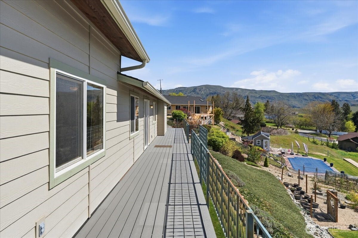 Deck spanning the entire width of the home