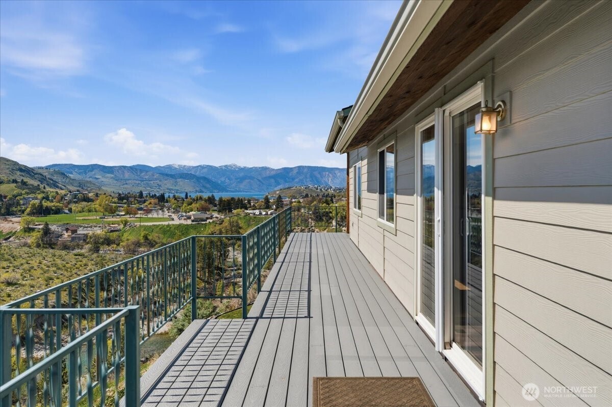 Deck spanning the entire width of the home