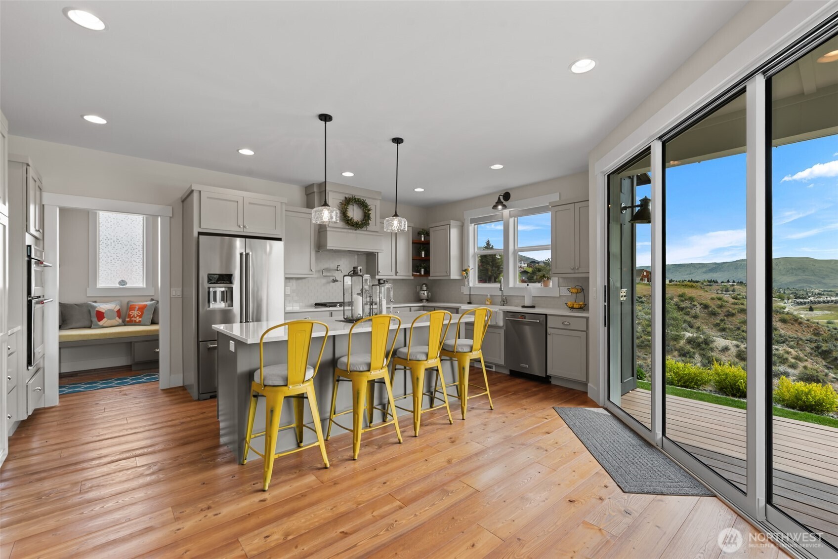 Kitchen eating bar and large glass doors