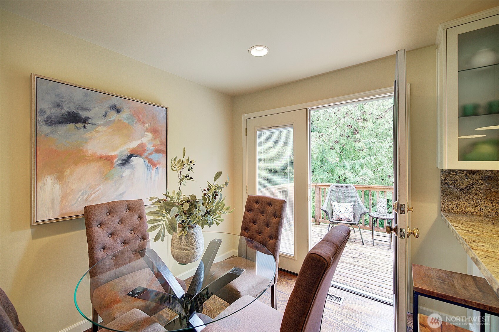 Dining area off kitchen with French doors to deck