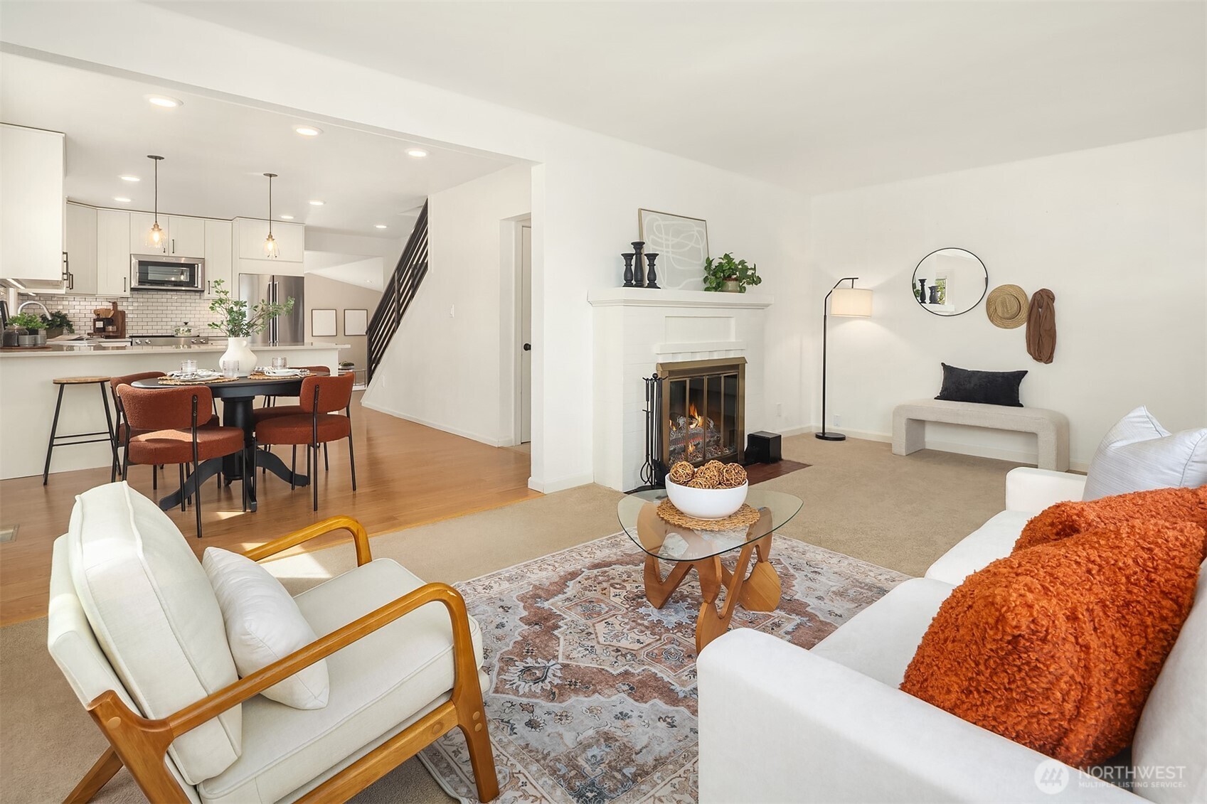 Living room with seamless flow into kitchen.