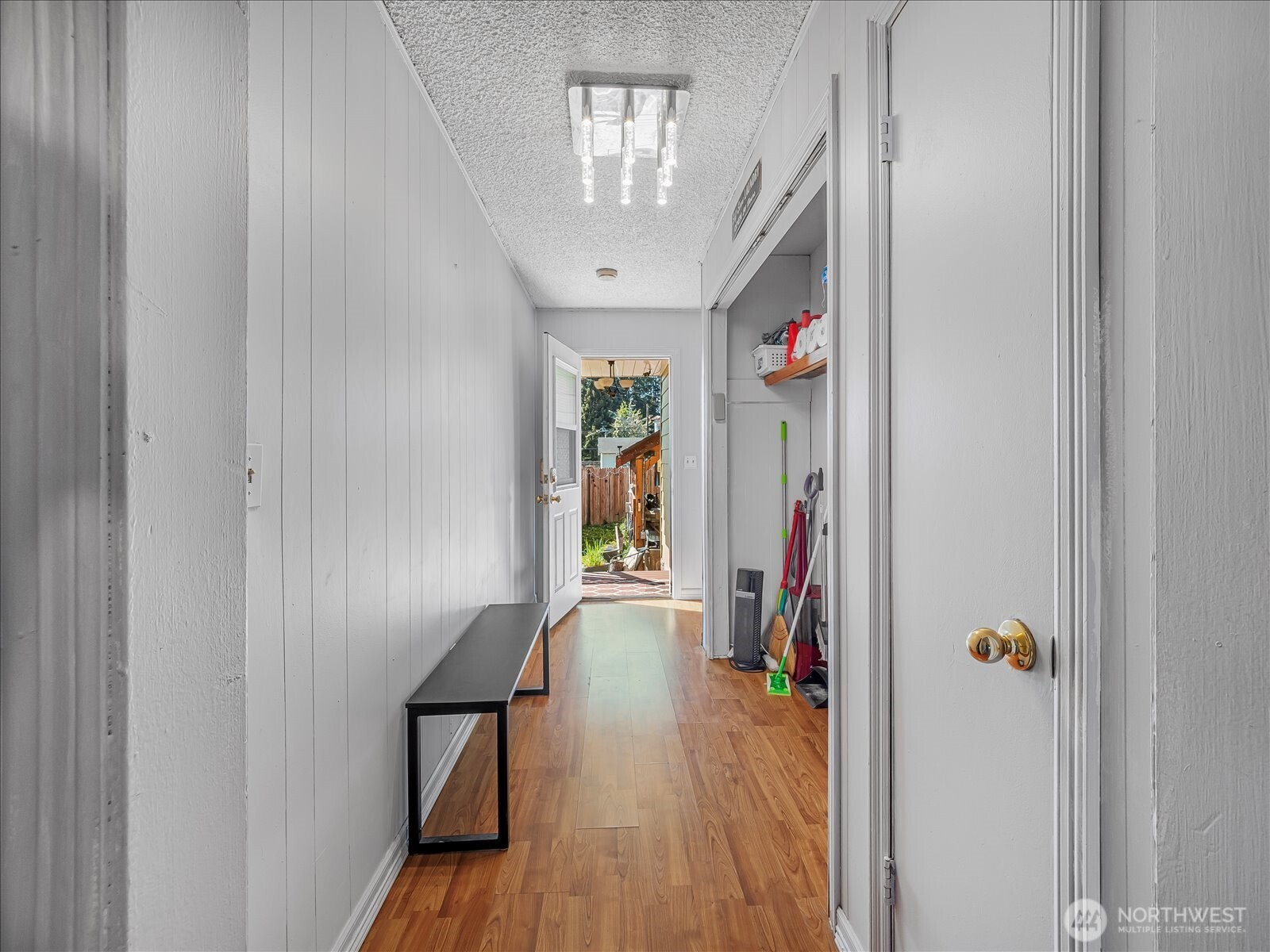 Hallway leads to the backyard