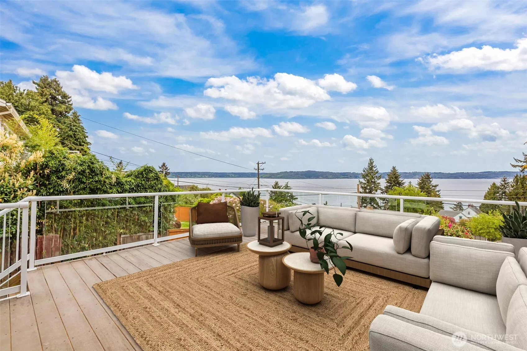 Step onto the deck and take in sweeping Puget Sound views, layered shorelines, and ever-changing skies.