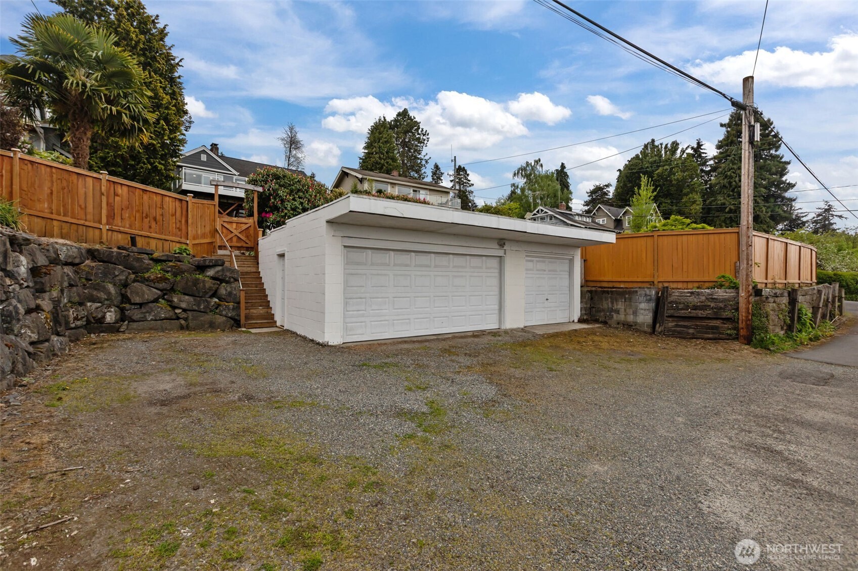 3 car garage off alley. Loads of storage available.