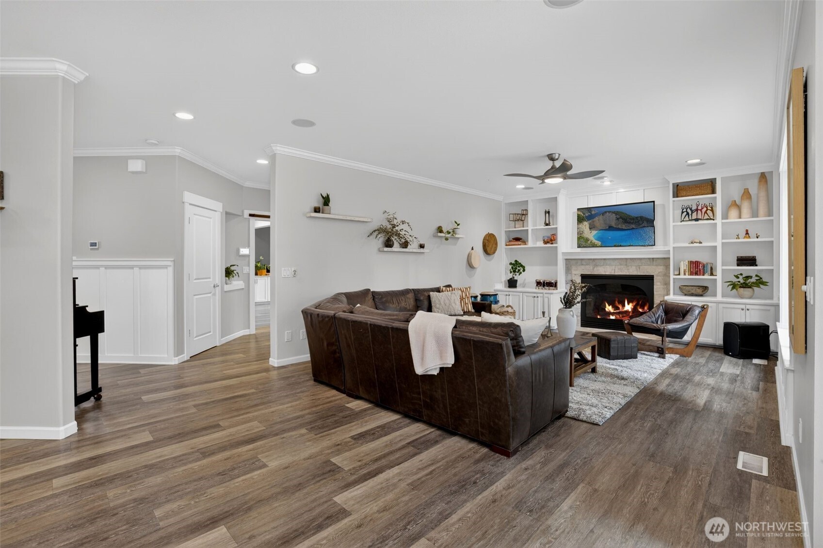 Gas Fireplace w/Stone Surround & Custom Built-Ins