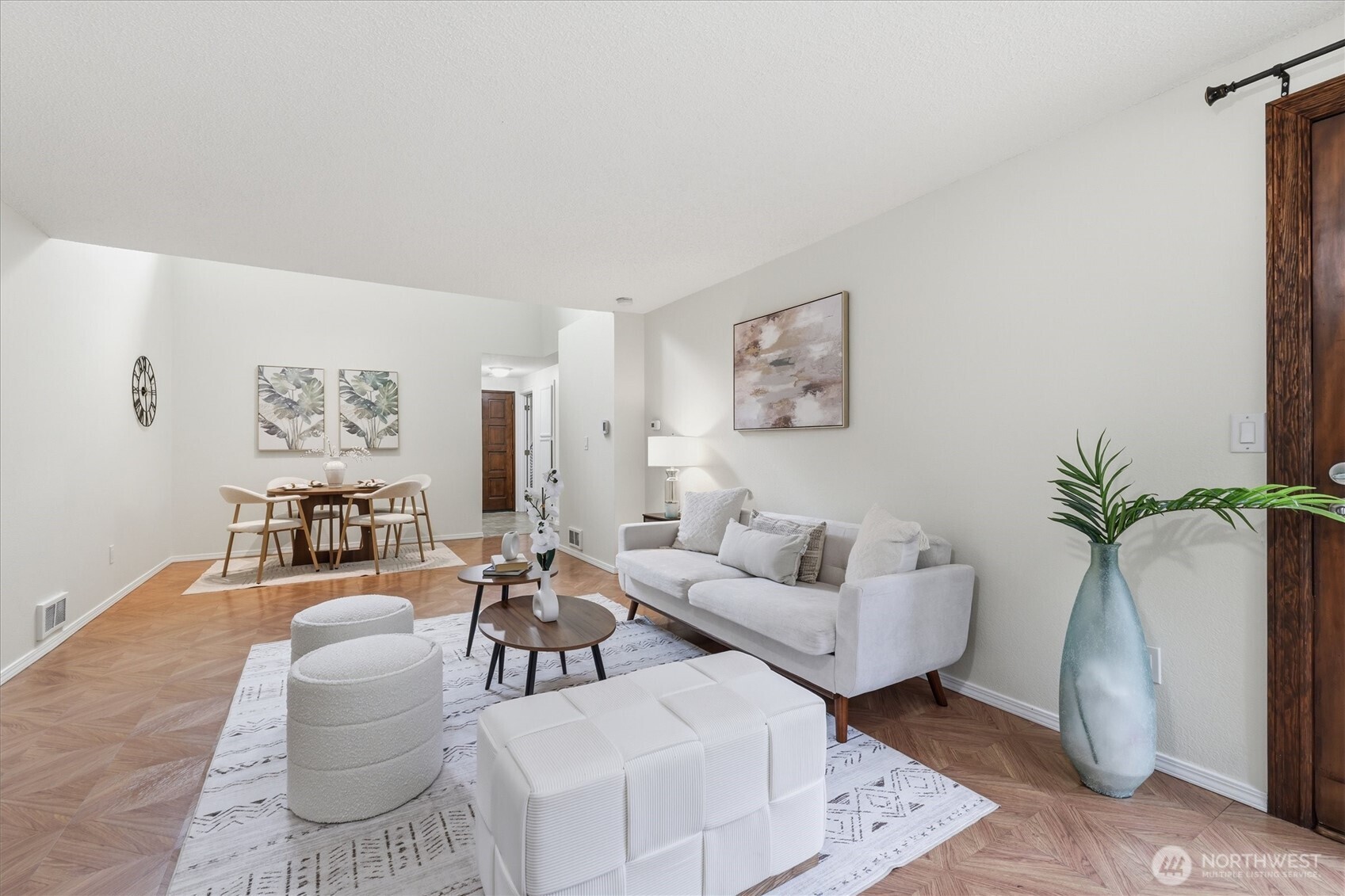The well-designed floor plan maximizes space with a spacious living room and a dining area.