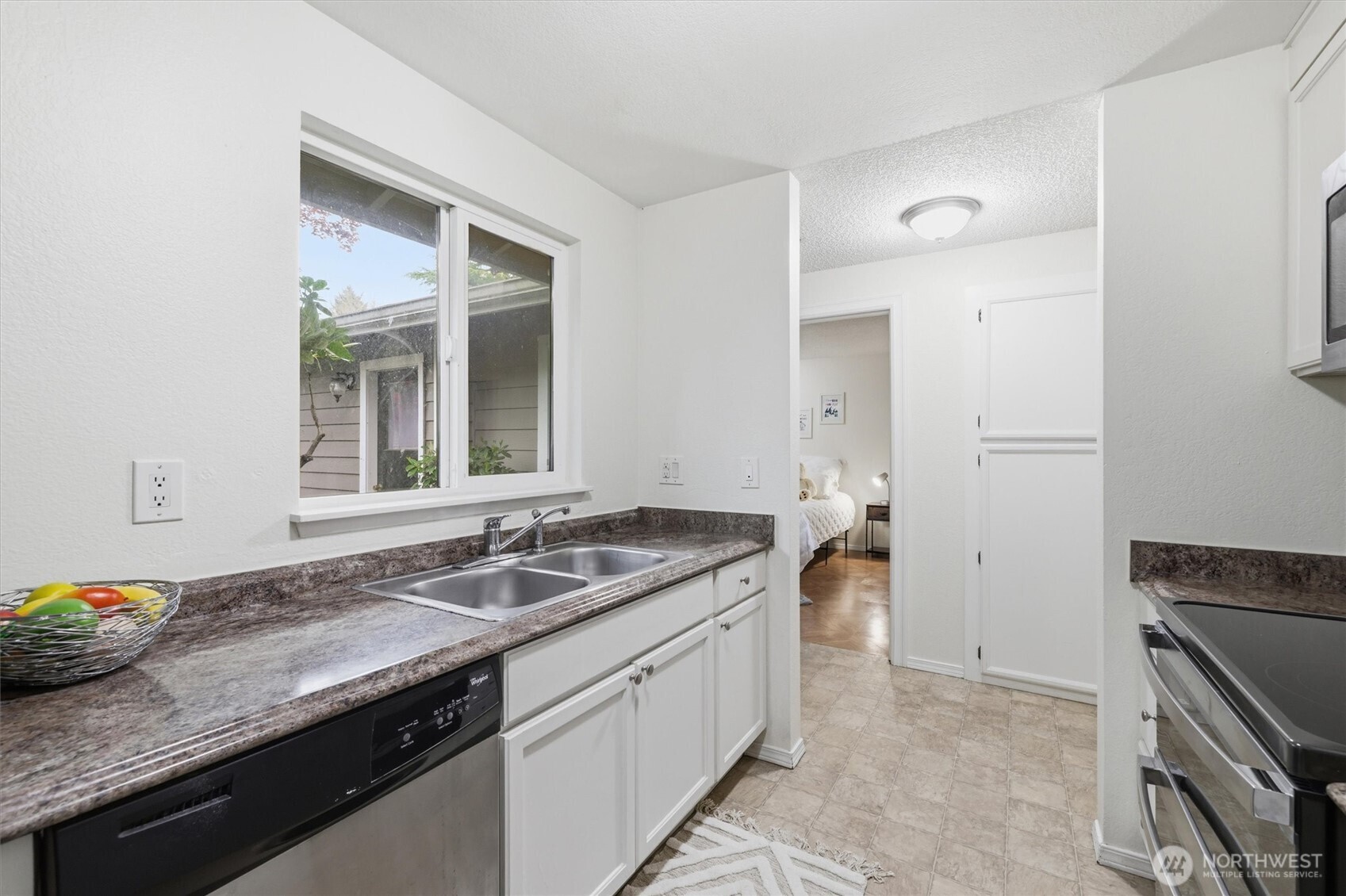 Enjoy a large window overlooking a garden space.