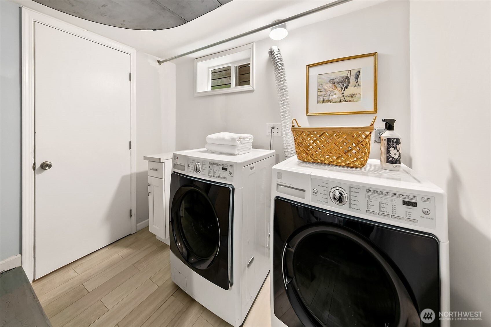 Shared laundry room found in the lower level.