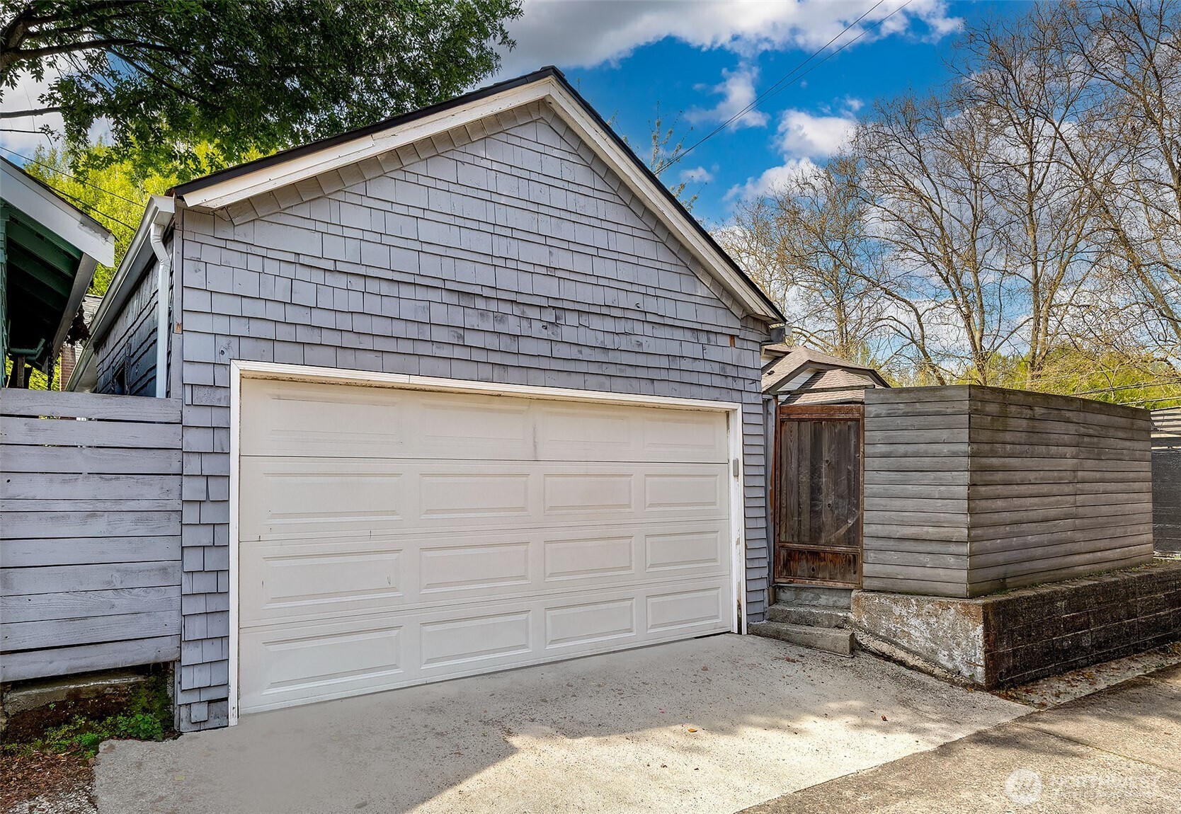 The garage which is located in the alley.