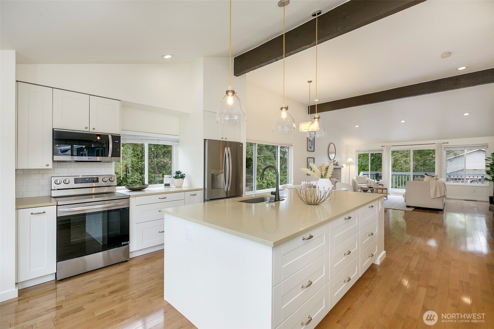 Incredible kitchen with huge island, lots of work space and ample storage.