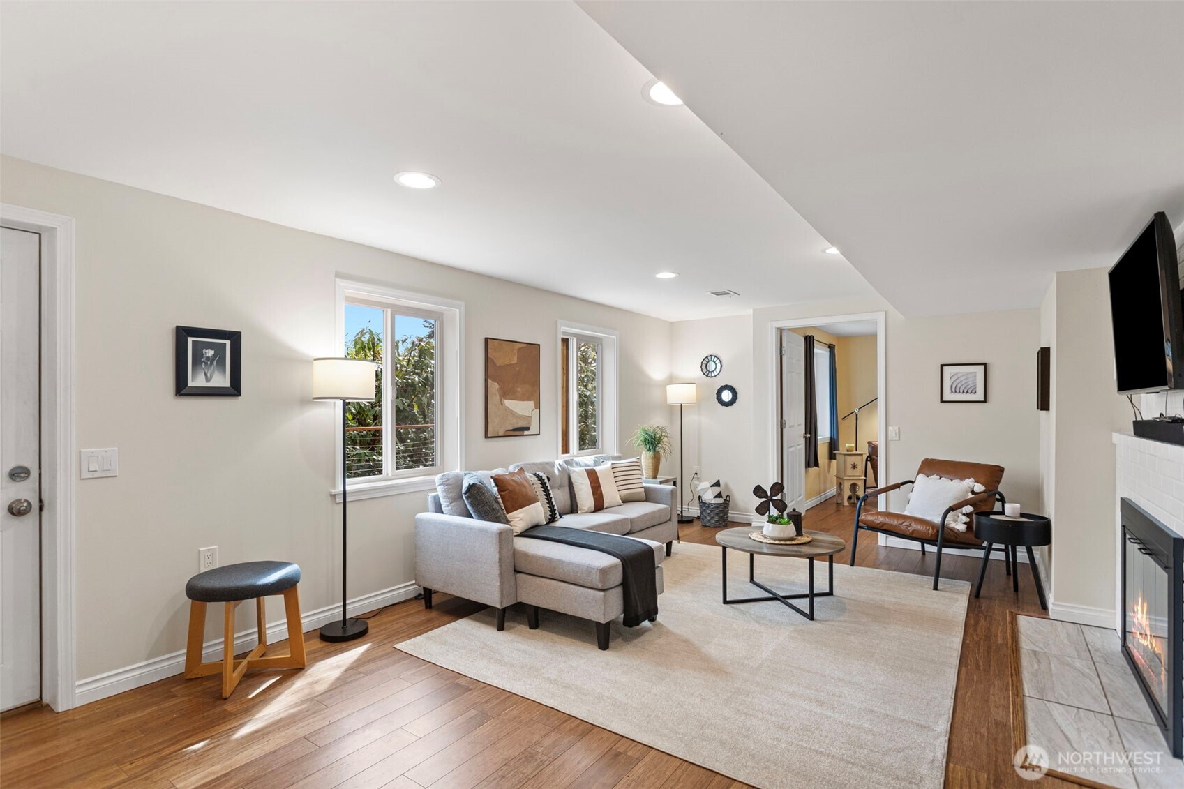 Family Room/Rec room/Media Room/Games Room—a great flexible space in the lower level. Separate from the main level with a pocket door at the bottom of the stairs.