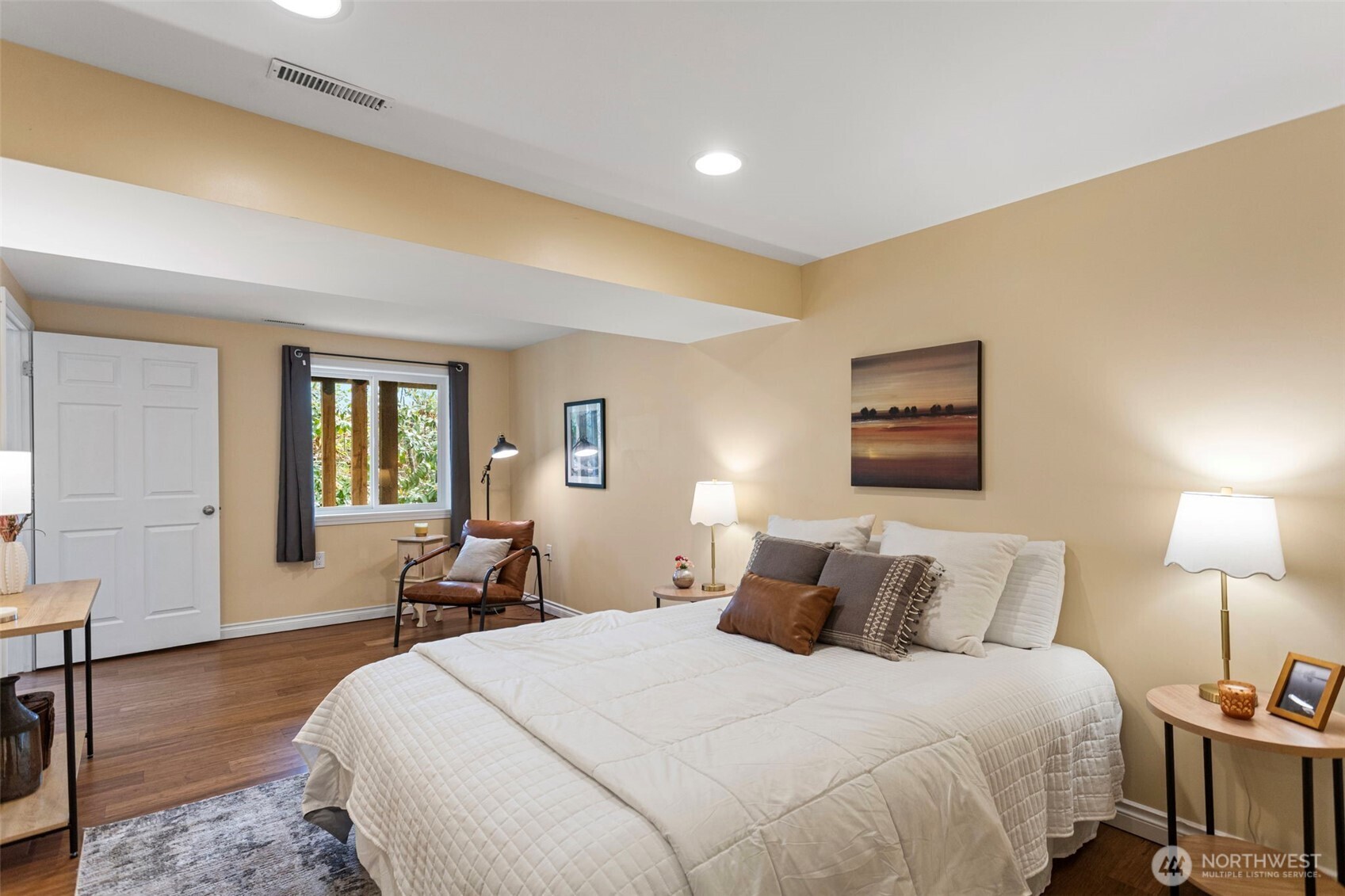 Another view of this large SE corner bedroom with plenty of space for extra seating and furniture.