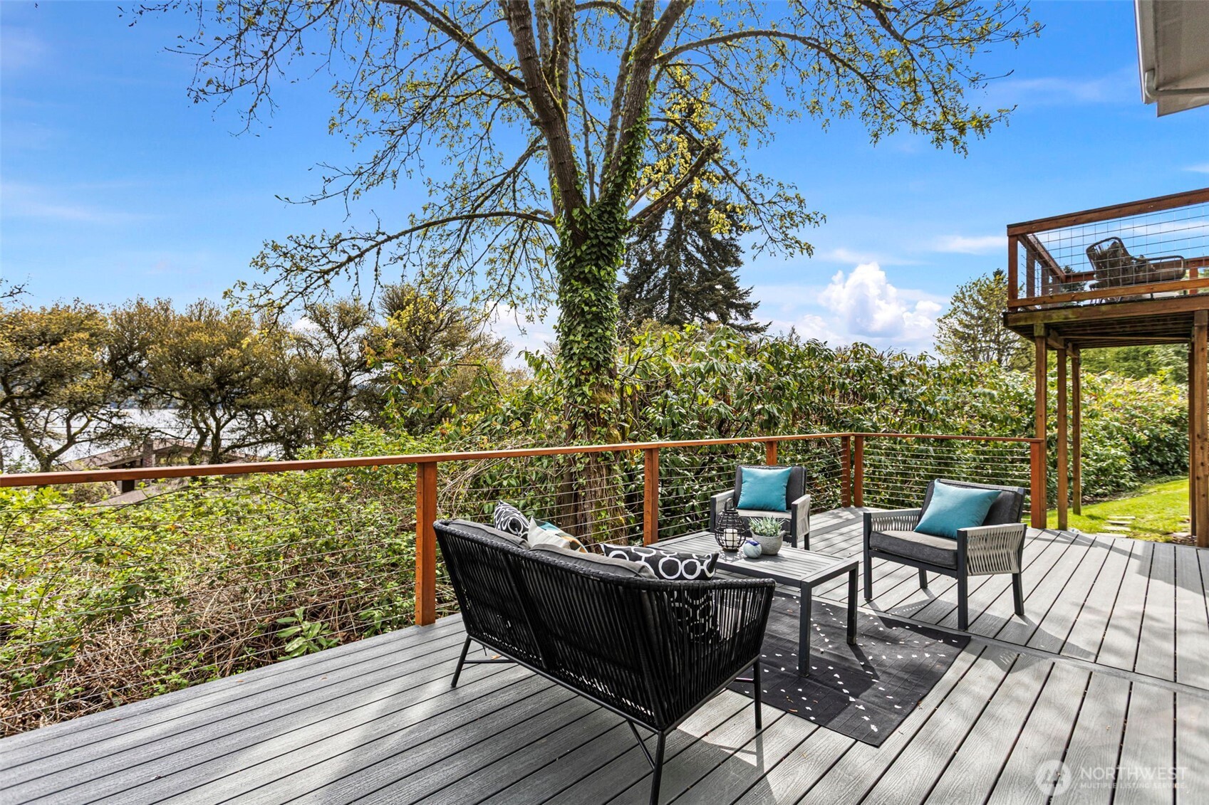Your choice of outdoor living with an elevated deck off the dining room or a larger lower deck off the lower level rec room! Lots of nature to enjoy, from bunnies and ducks on the trail, to ospreys and eagles nesting in the trees!