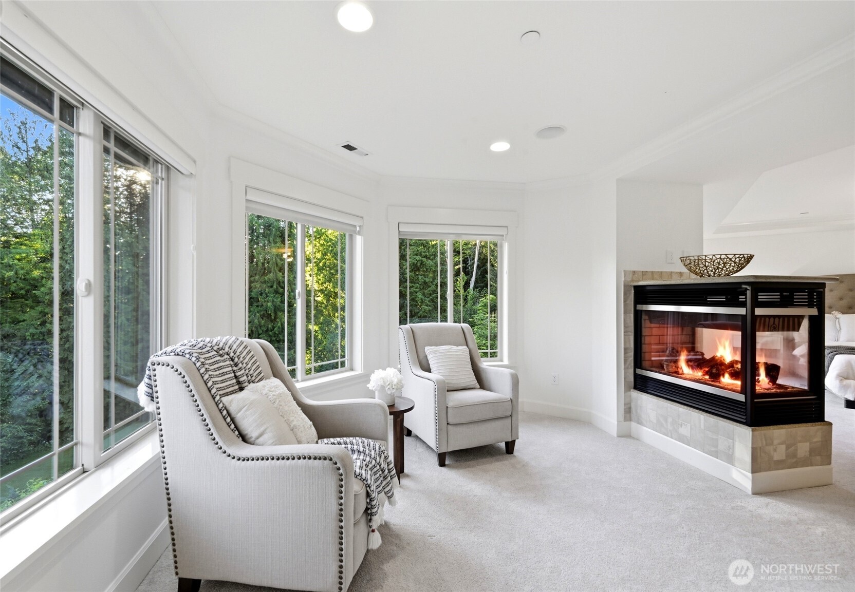 The Primary Suite relaxing sitting room, overlooking the grounds & sunsets
