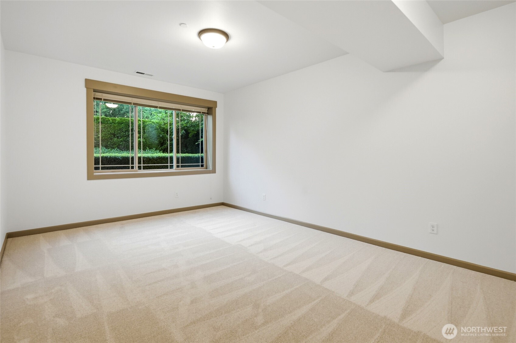 Lower level suite. Also features a full bath just outside the bedroom.