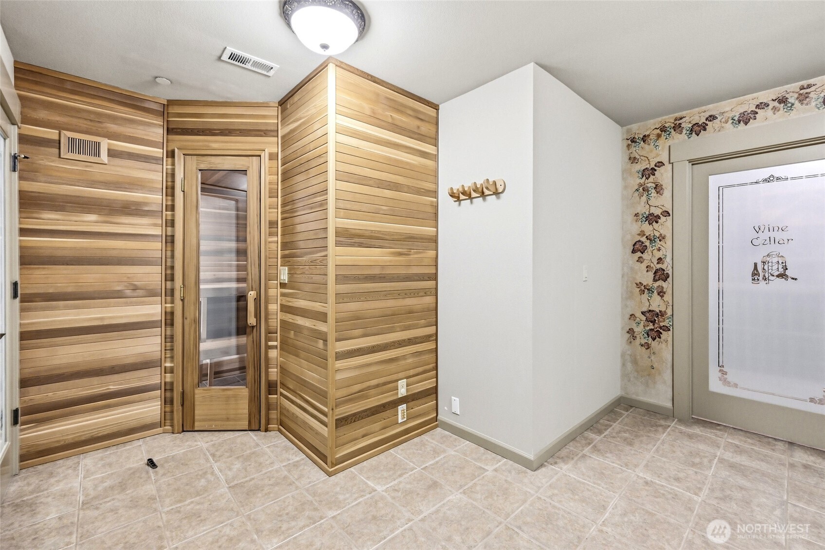 Expansive area featuring a sauna and a walk-in wine cellar. There is also a substantial amount of extra space here for crafts, games, storage and more.