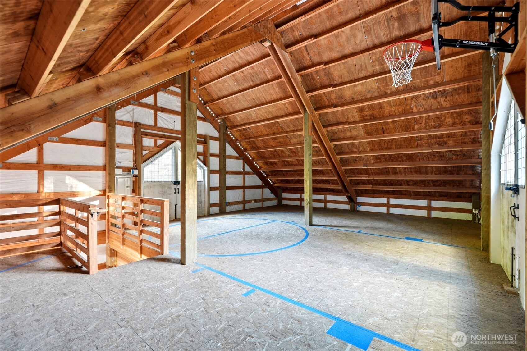 The upper level of the barn, previously used as a basketball court