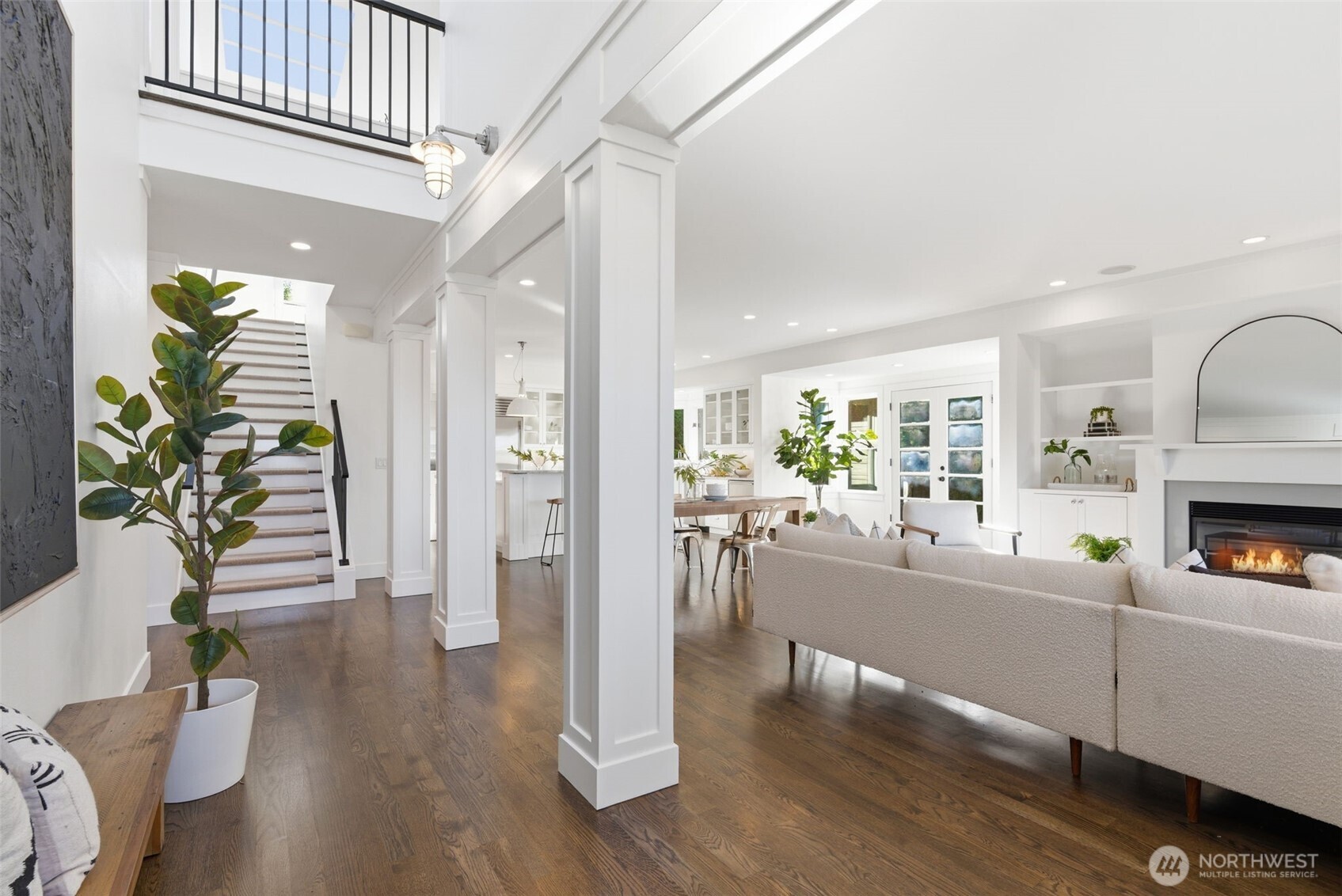 Two story entry offers a peek of the upper level and skylights.