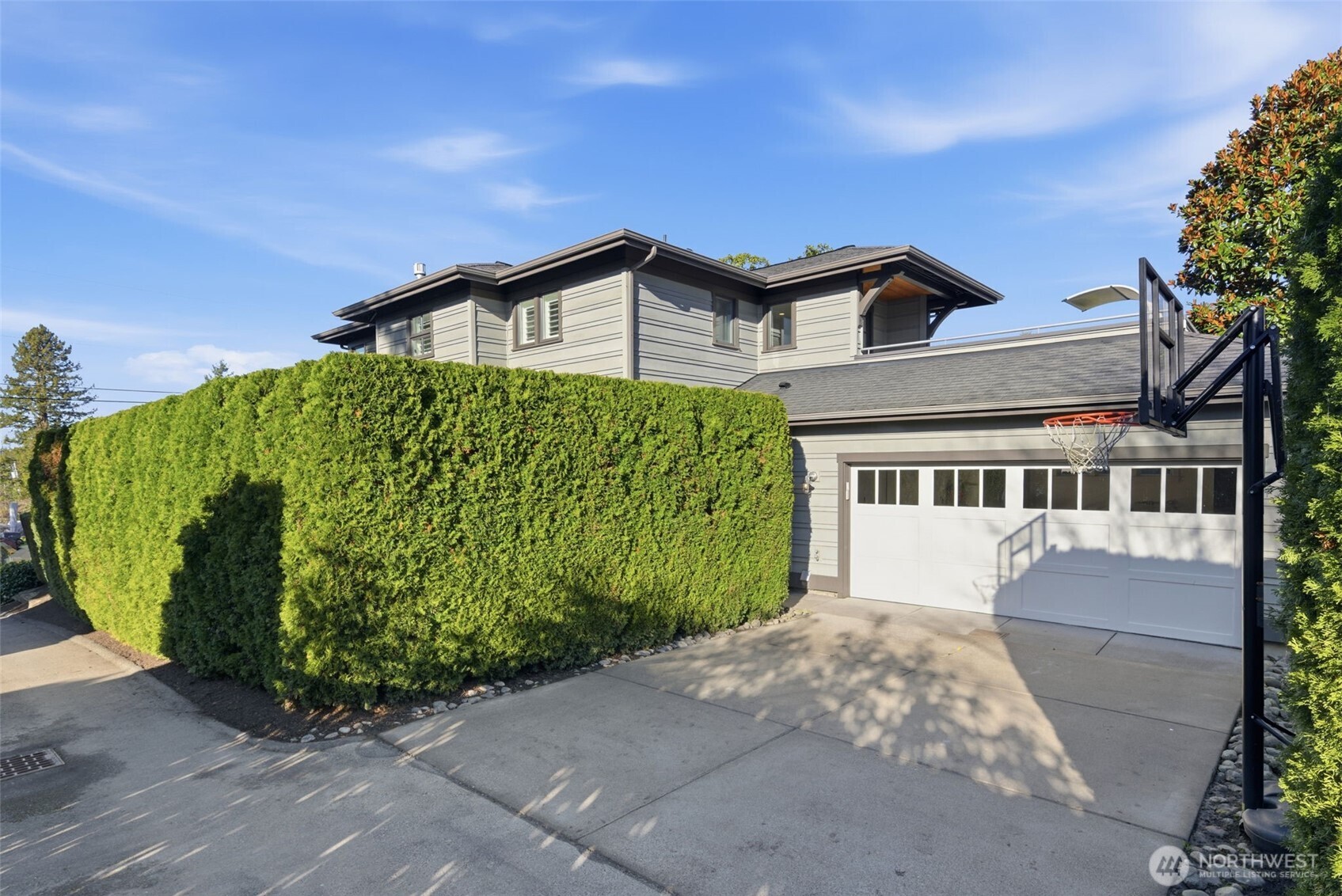 Ideal alley access to two-car garage with storage cabinets. The home also has a Generac back up generator with automatic transfer switch – such a luxury anytime the power goes out.