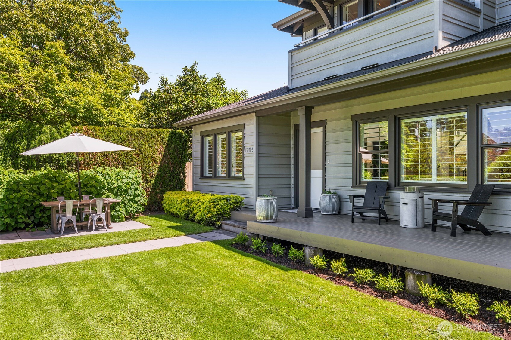 A summertime view, with the hydrangeas just on the brink of bursting with fragrant white blooms.