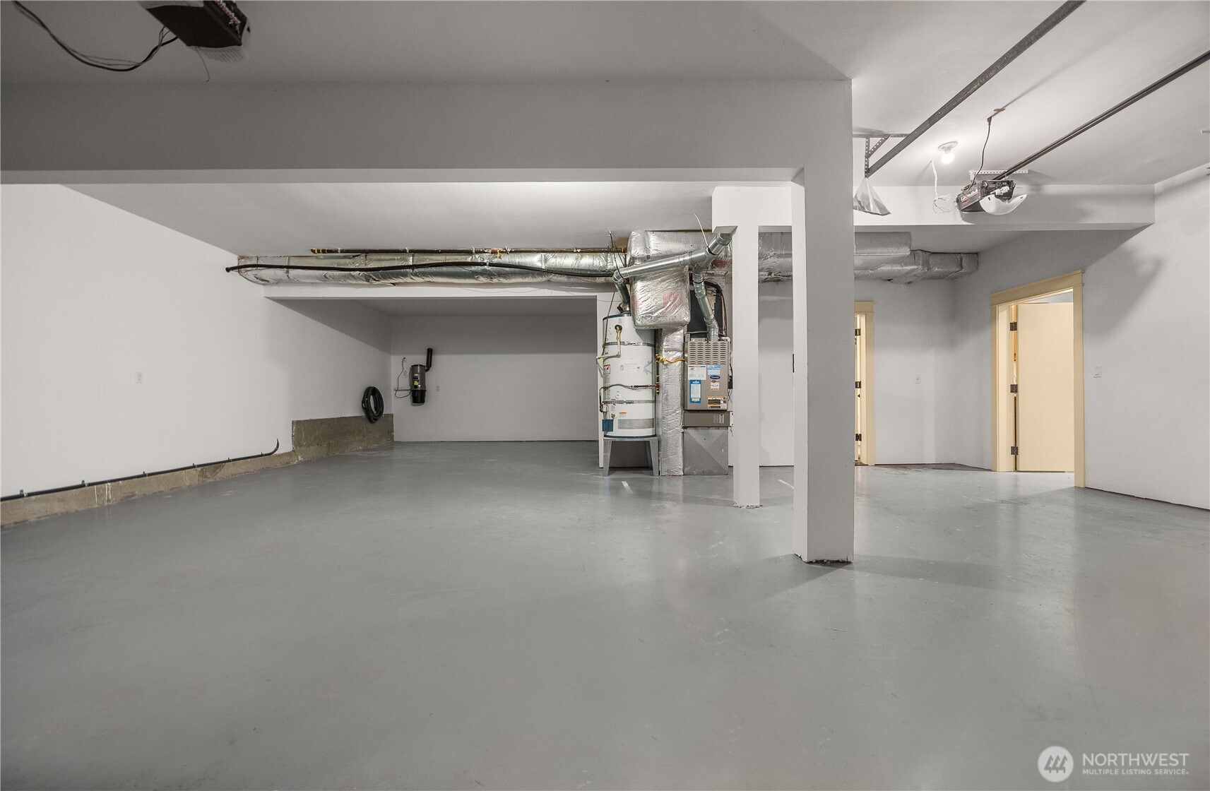 A rare 4car garage; a bonus room with a sink and outlets for an extra washer/dryer unit; whole house generator; sprinkler system