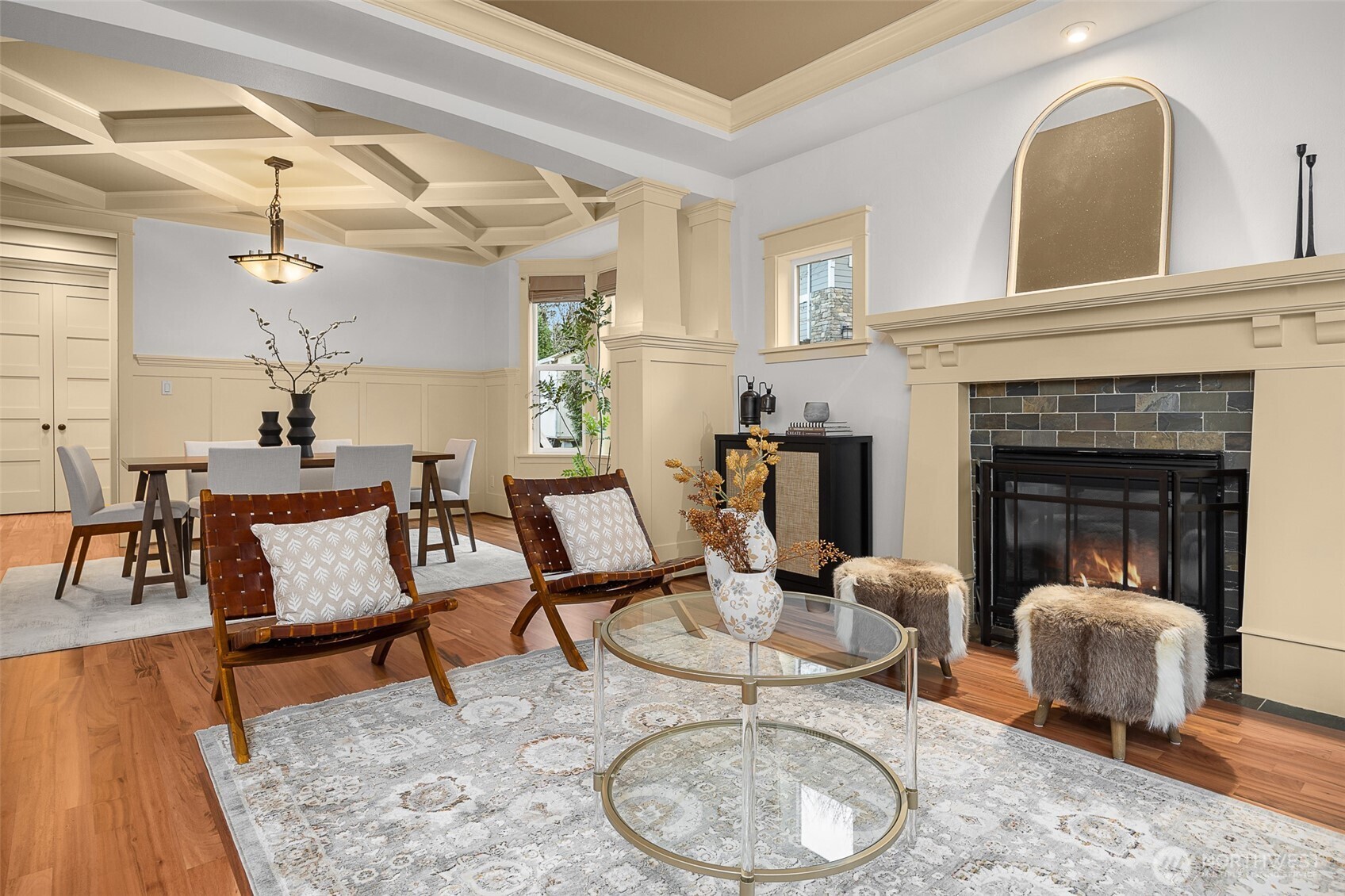 Coffered ceilings; a living room in an open space connected to the dining room
