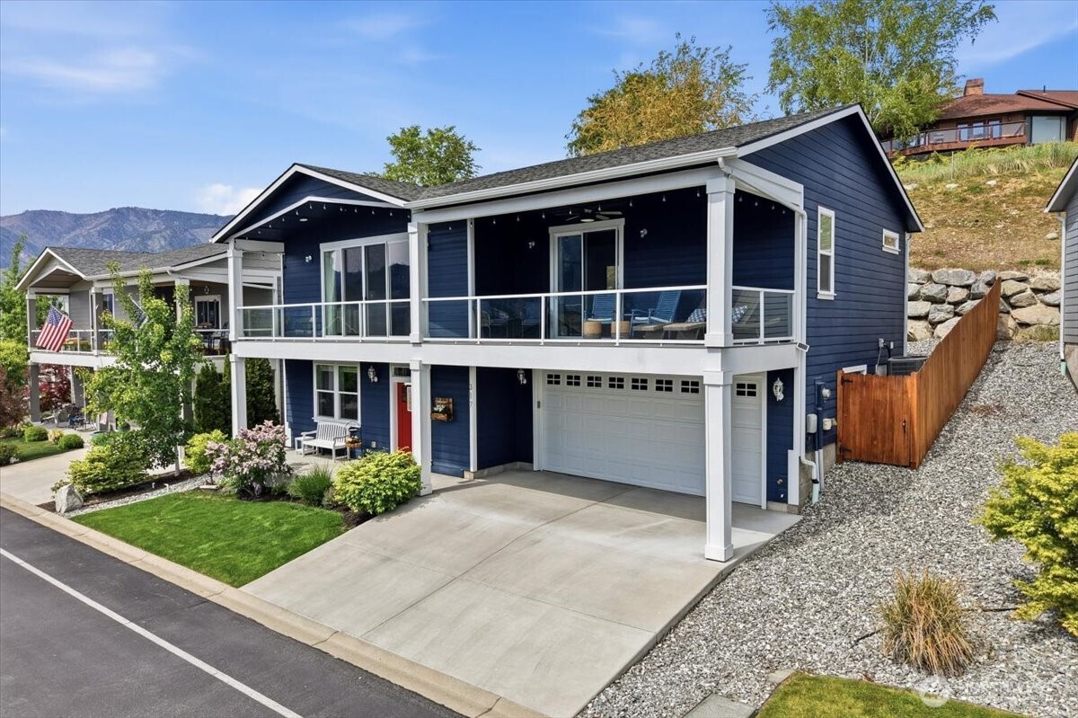 Fully fenced backyard and remotely controlled sprinkler system support easy lock-and-leave living while away.