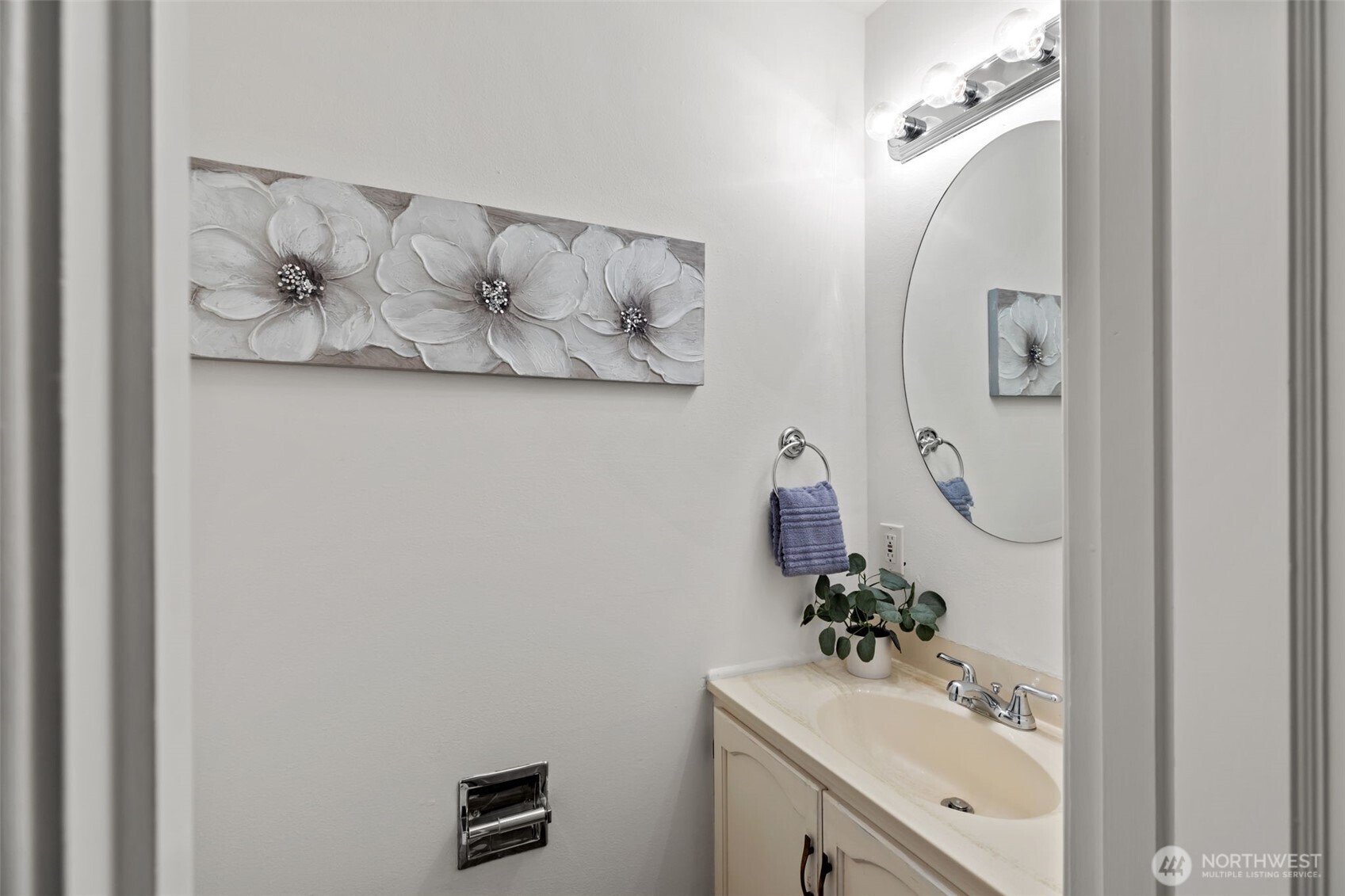 Primary en suite half bath.