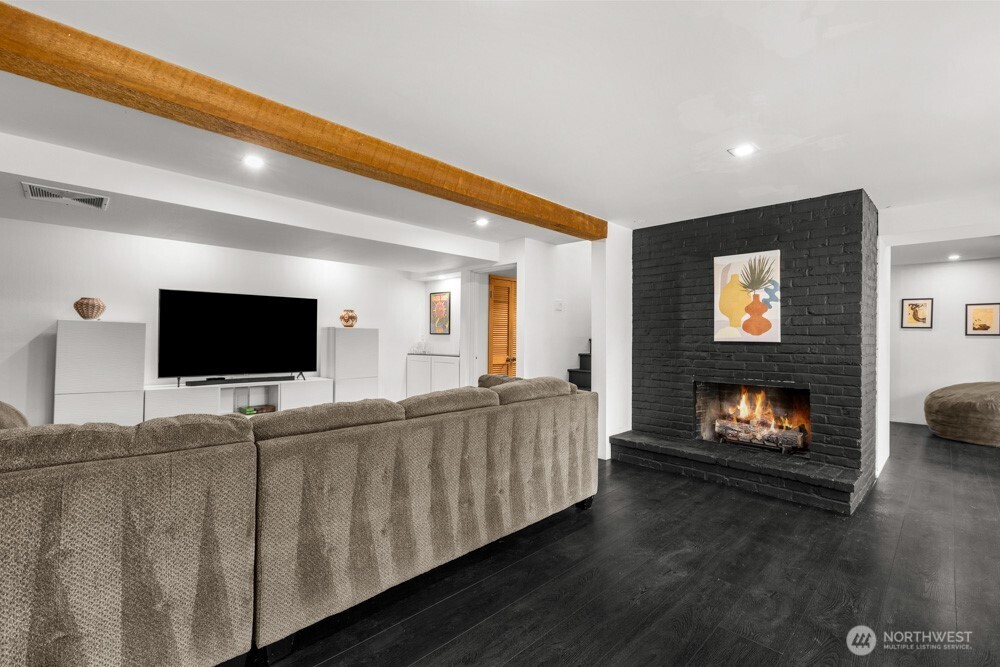 Enjoy a warm, inviting rec room with a gas fireplace plus bonus finished space for added versatility