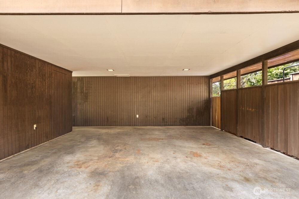 Clean carport with additional storage space.